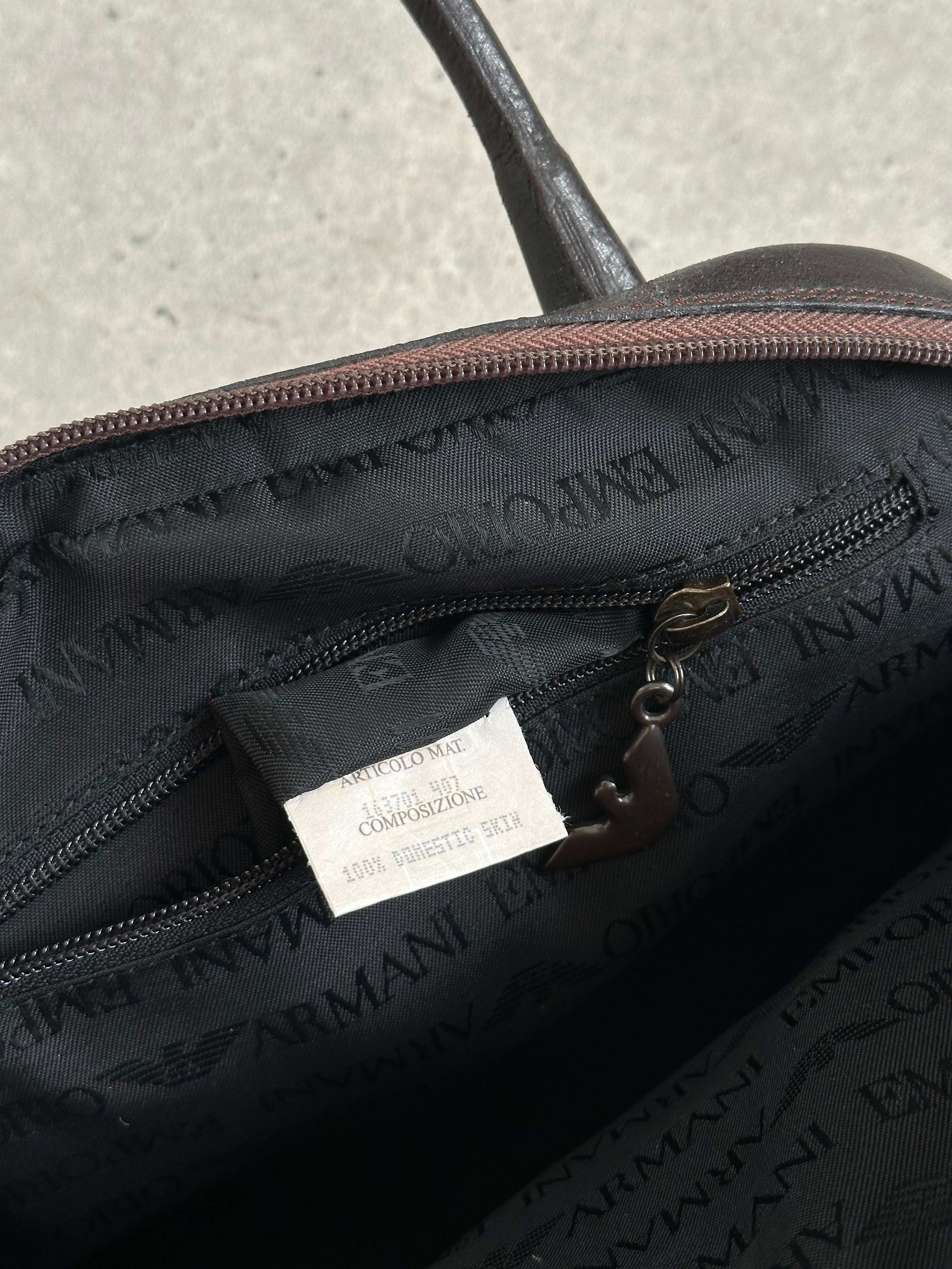 Emporio Armani 2000s leather handbag with sleek design, featuring sturdy handles and classic logo embellishment.