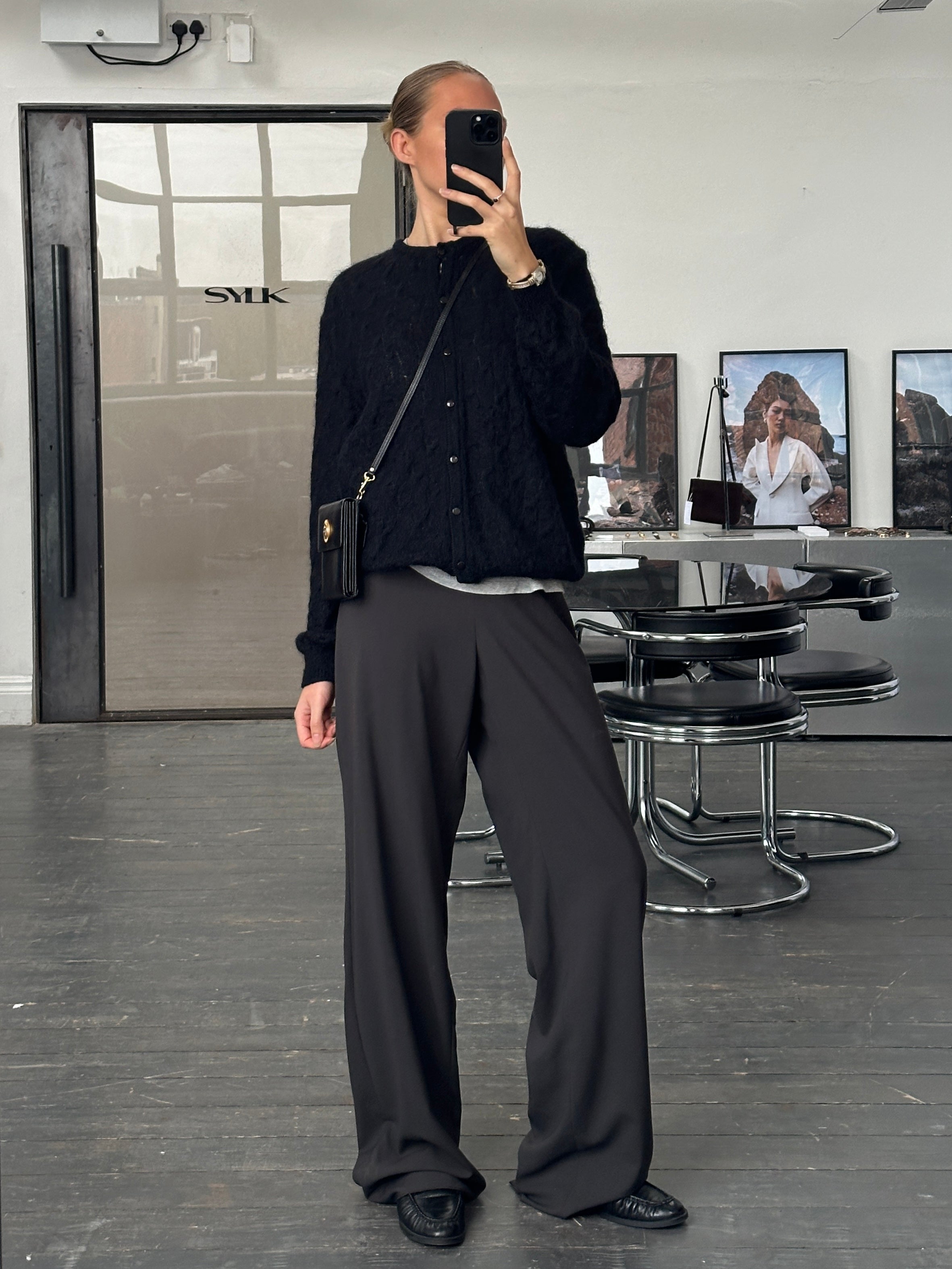 Armani Collezioni pure wool wide-leg tailored trousers in size W34, shown on a model with a clean, professional fit.