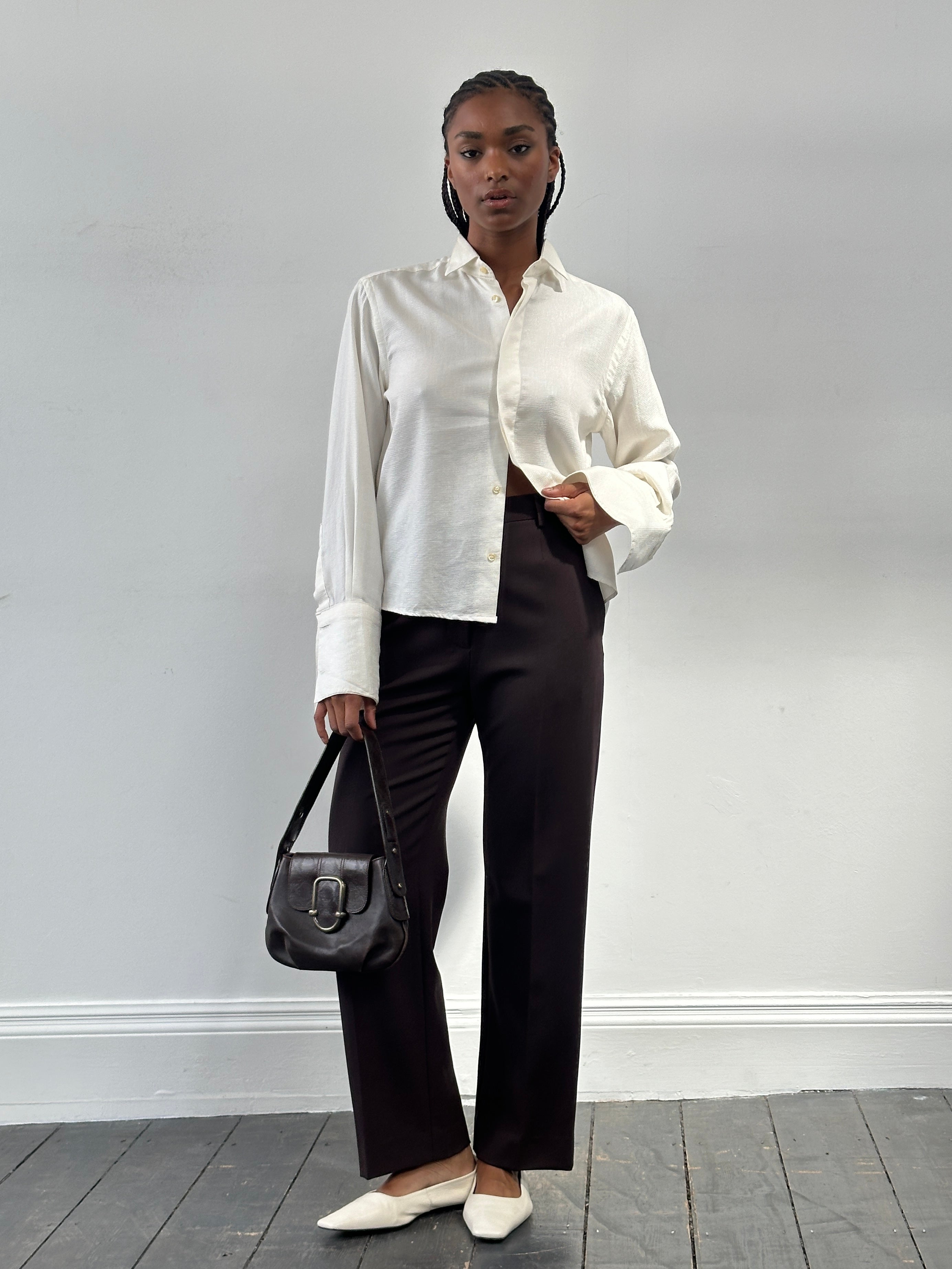 Max Mara high-waisted wool tailored straight-leg trousers in W26, shown on a hanger against a neutral background.
