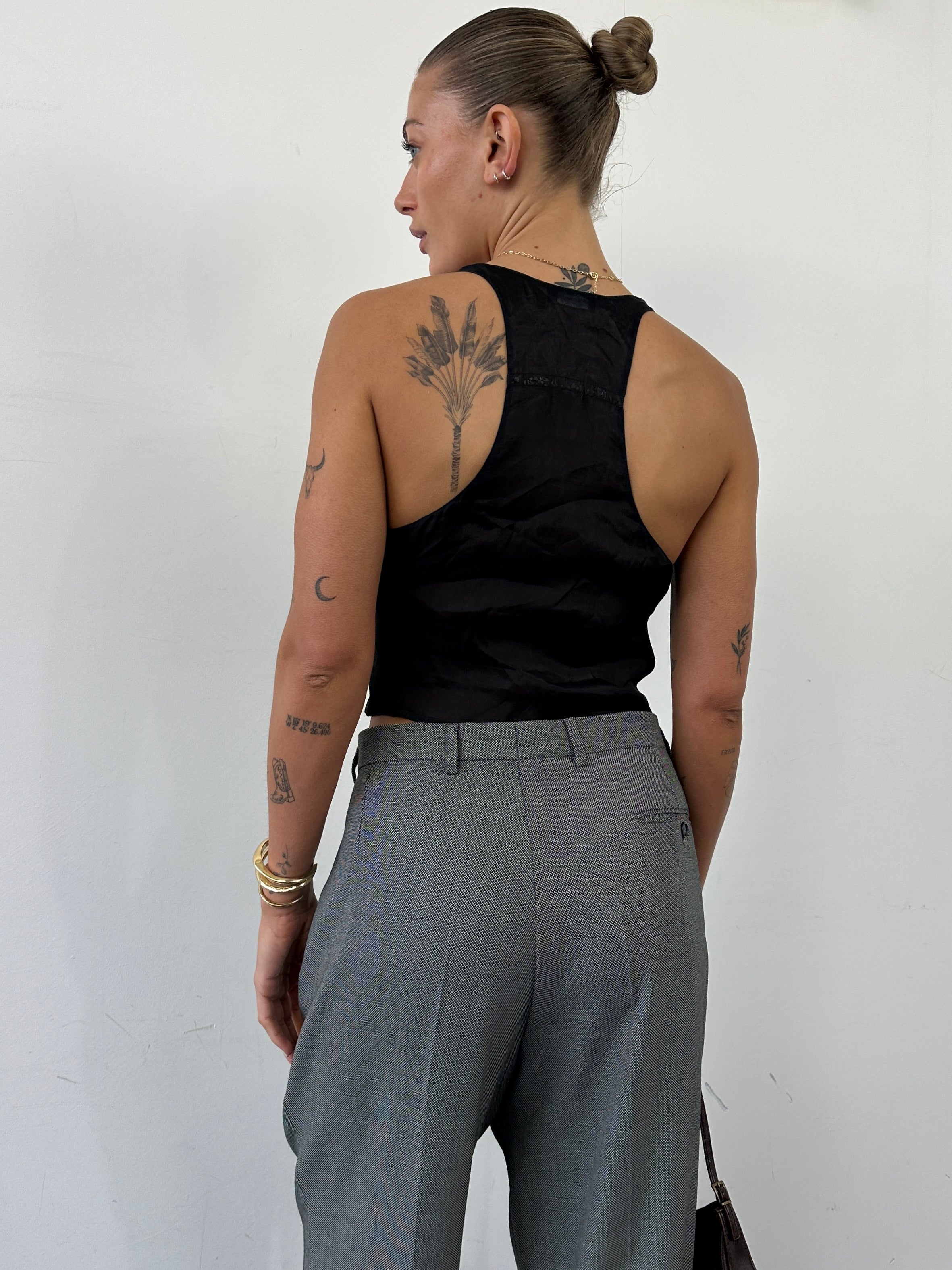 Emporio Armani tailored silk mesh back waistcoat in size S, featuring a sleek design with fine stitching and mesh detail at the back.