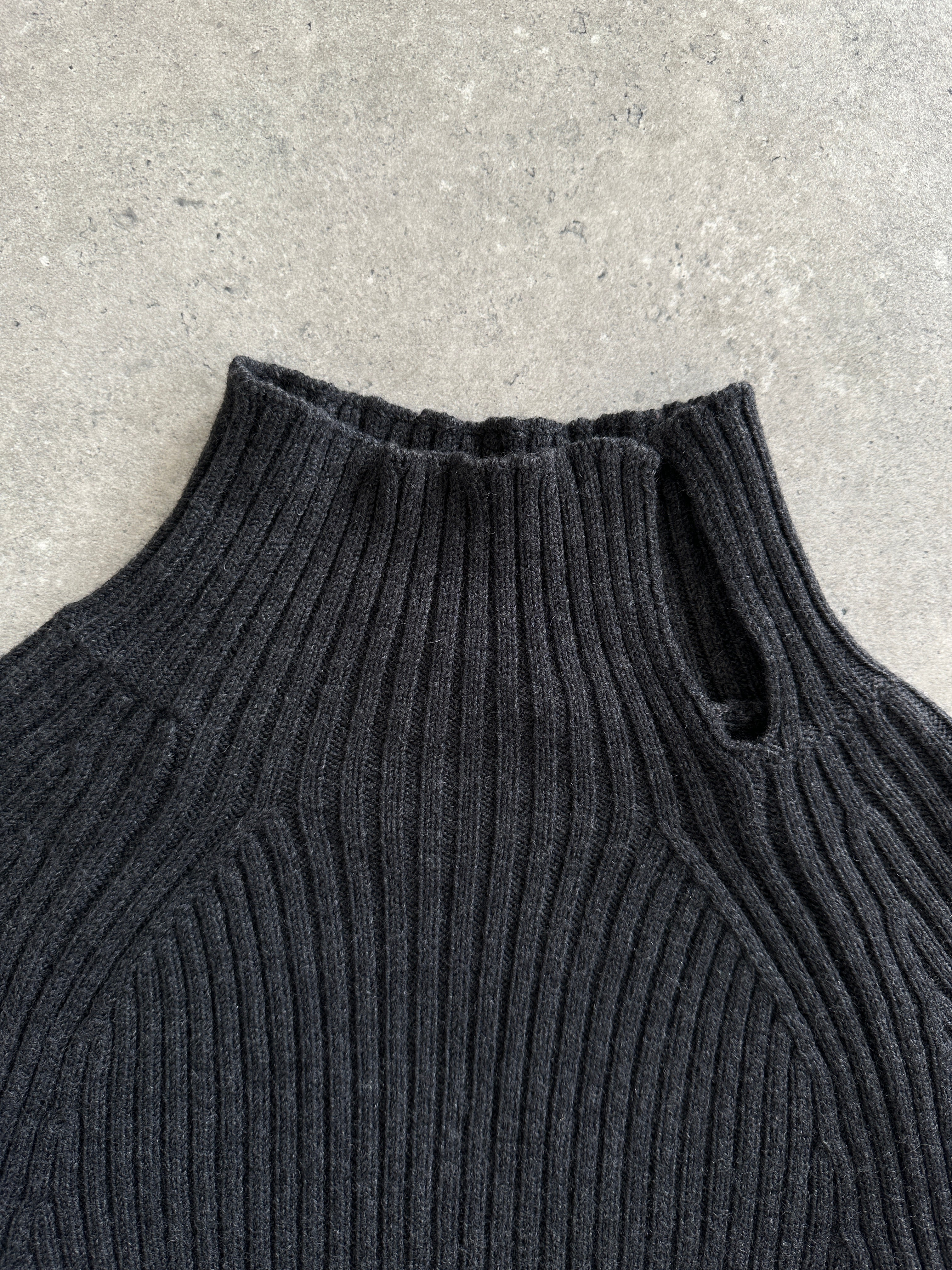Max Mara pure wool asymmetric high neck knit jumper in soft beige, featuring a high neckline and relaxed fit.