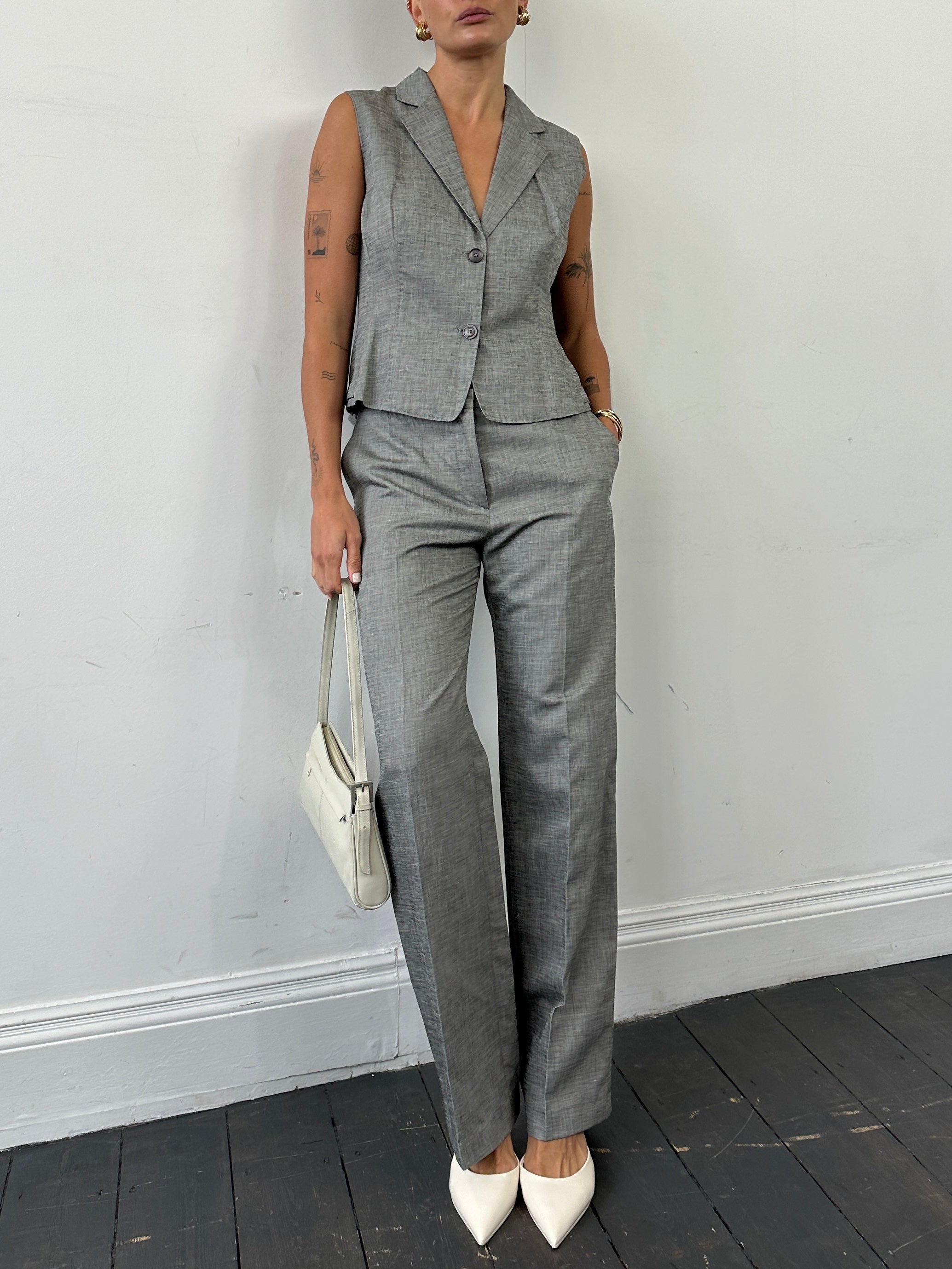 Max Mara linen and cotton two-piece waistcoat and trousers co-ord set, featuring tailored fit and neutral fabric tones.