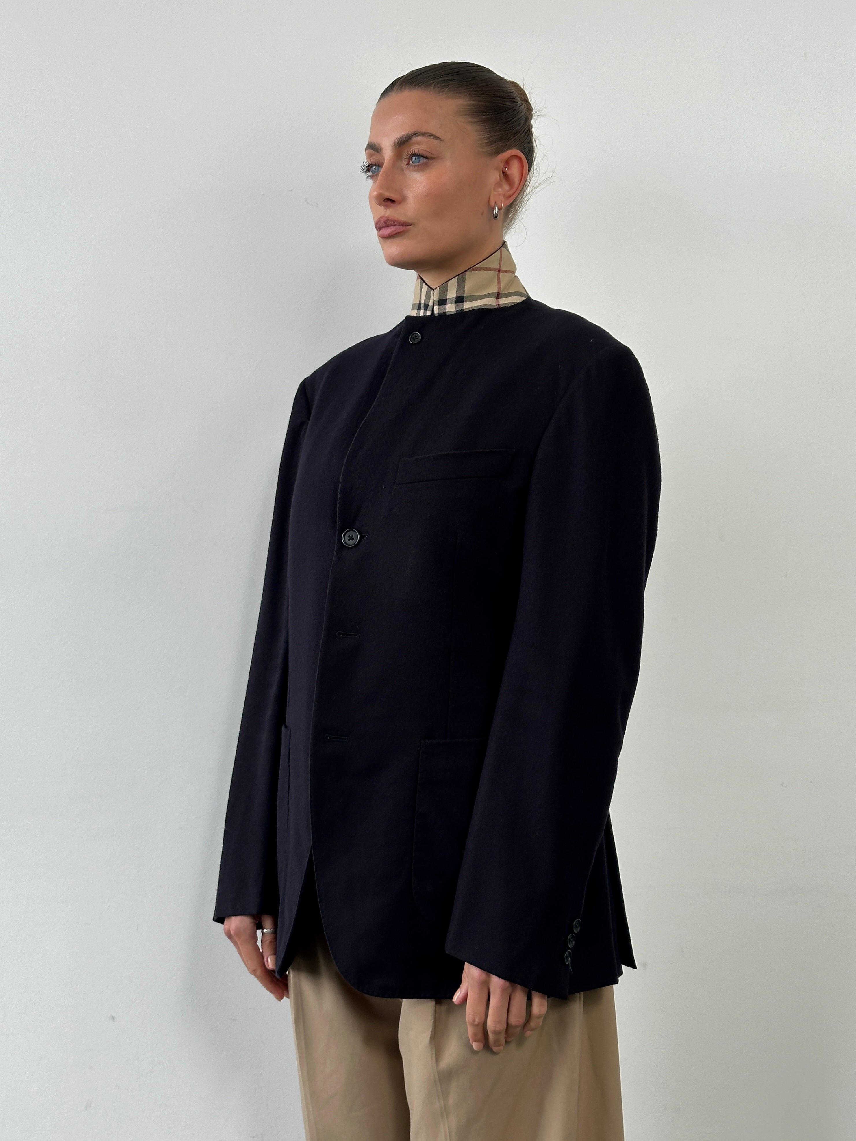 Burberry London high neck Nova Check wool blazer in size 38R/M displayed on a mannequin. Classic check pattern and tailored fit.