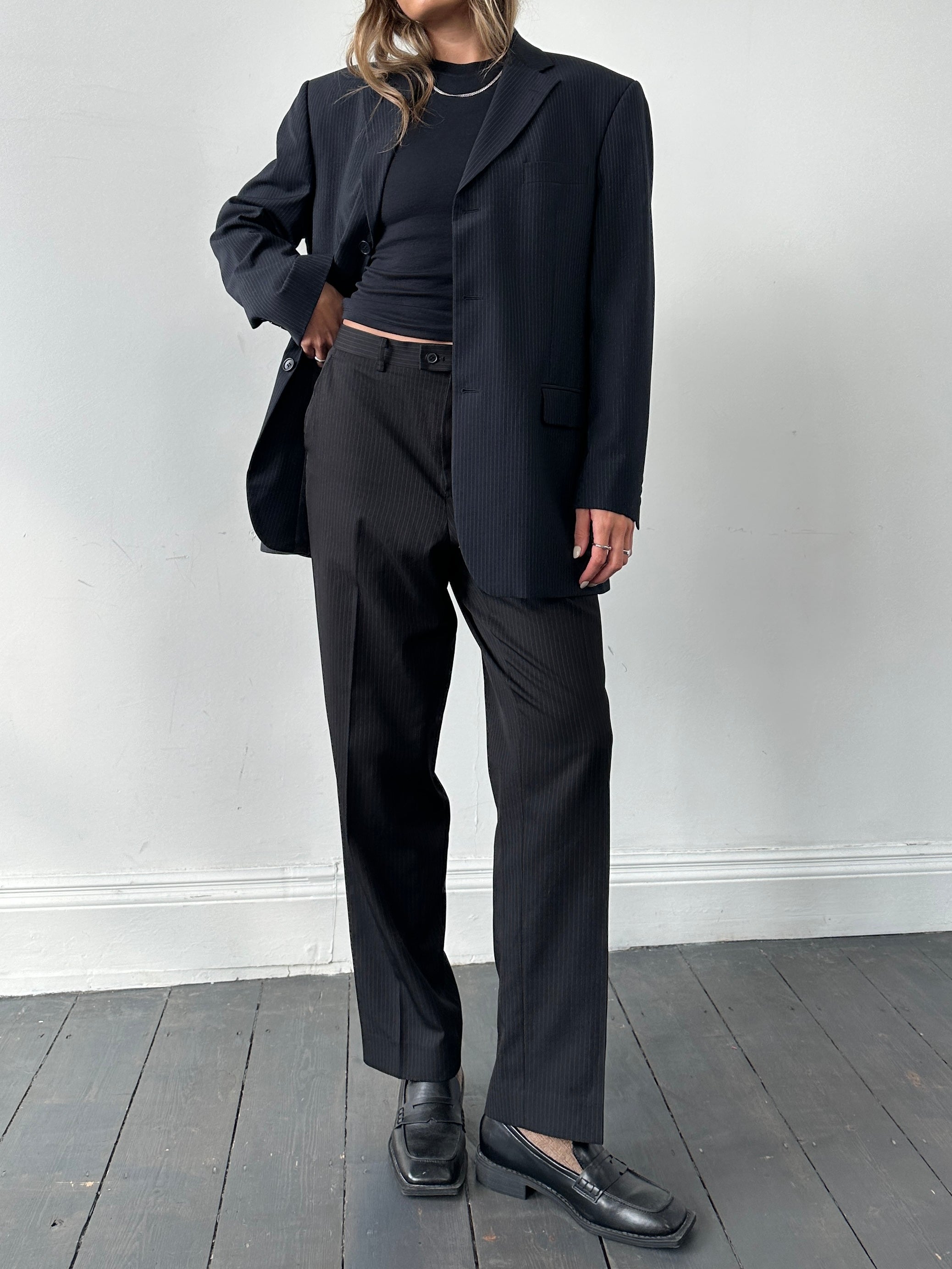 Balmain pinstripe wool blazer in size 42R/XL, single-breasted design with notch lapels and tailored fit.