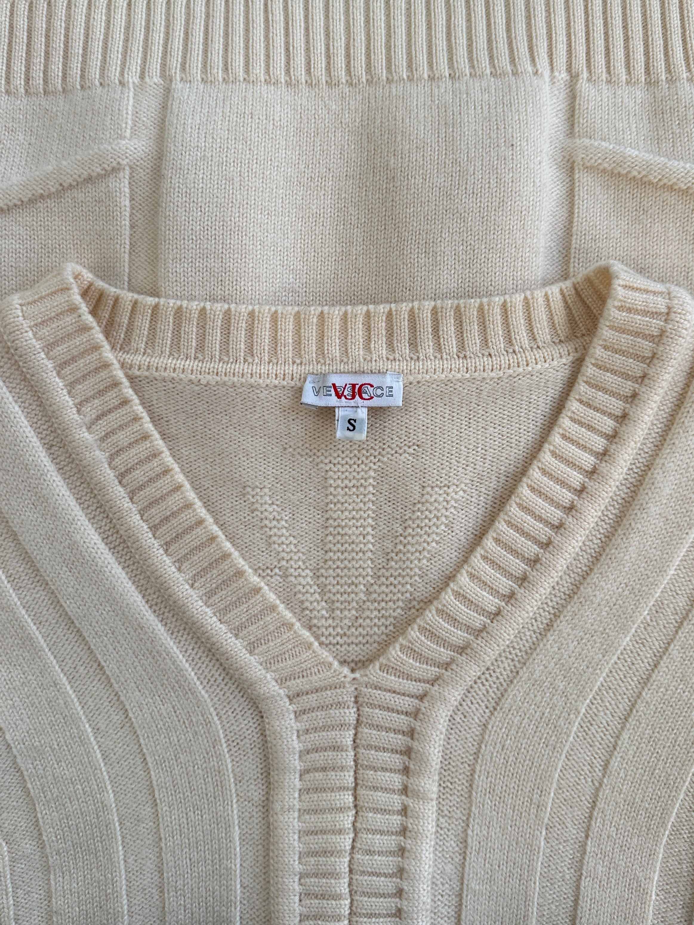 Versace Jeans Couture 2000s pure merino wool structured knit jumper in XS/S, featuring a classic design and textured fabric.
