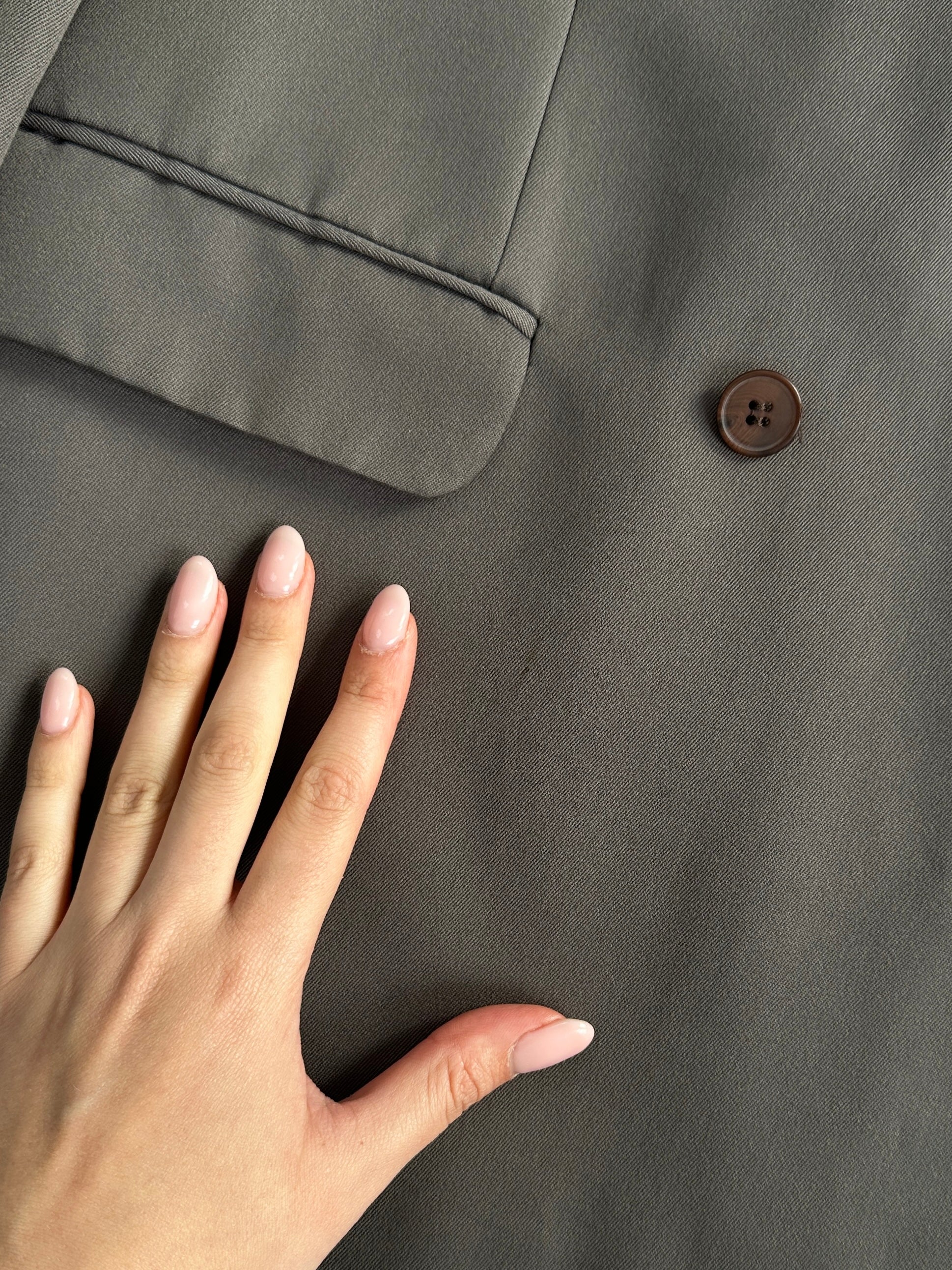 Vintage British double-breasted jumpsuit in size 40R/W32, featuring classic vintage tailoring and stylish design.