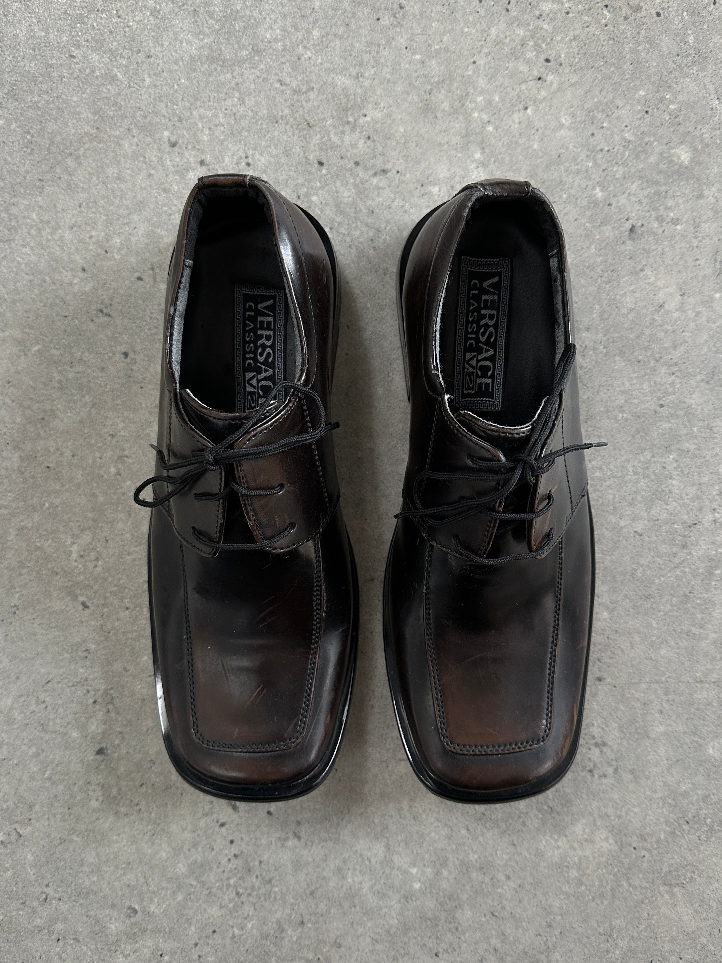 Versace Classic V2 leather square toe loafers in black, UK size 7, stylish men's shoes with sleek design and polished finish.