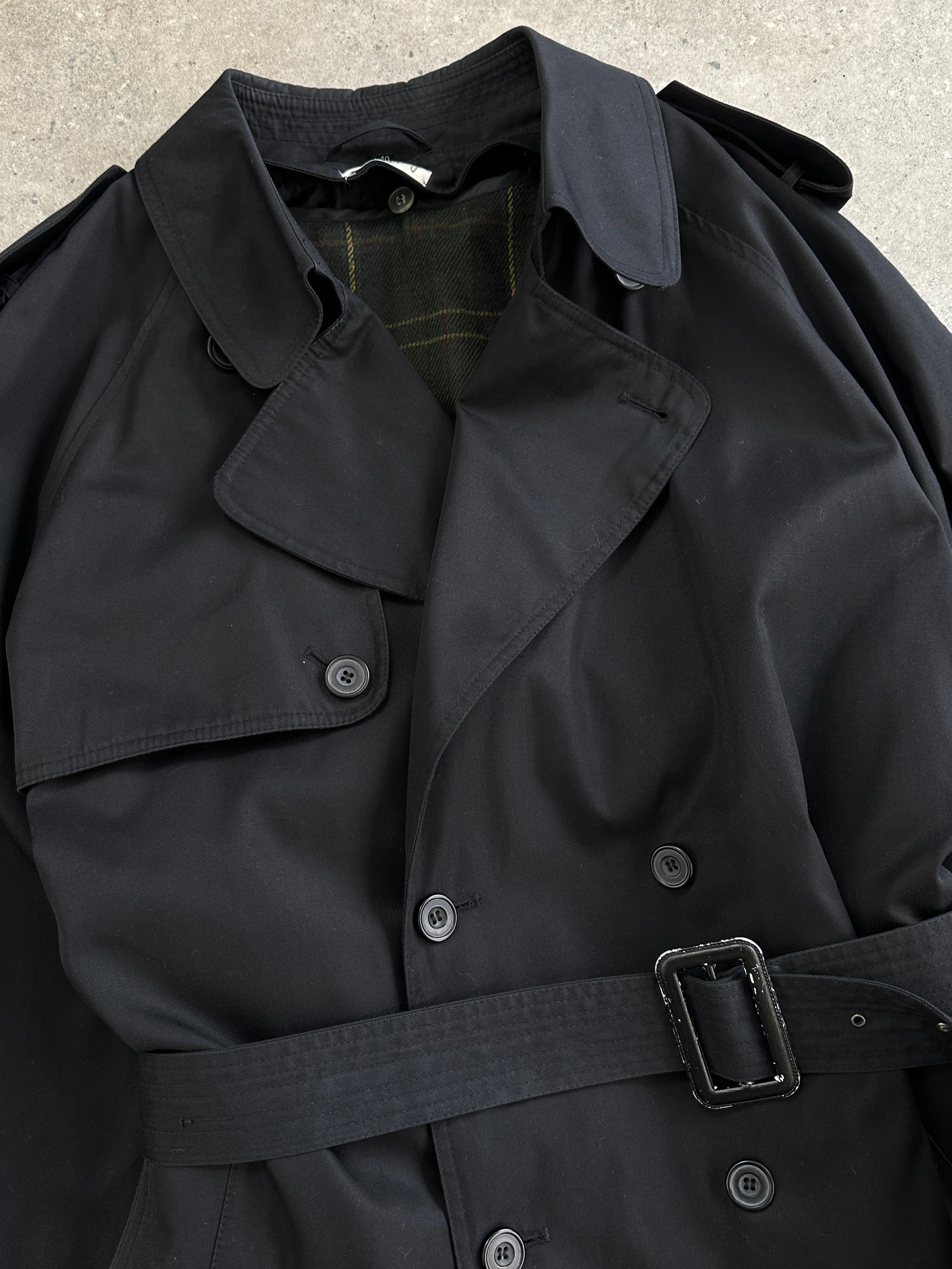 Vintage double-breasted belted trench coat in XL with classic style and tailored fit, perfect for timeless outerwear fashion.