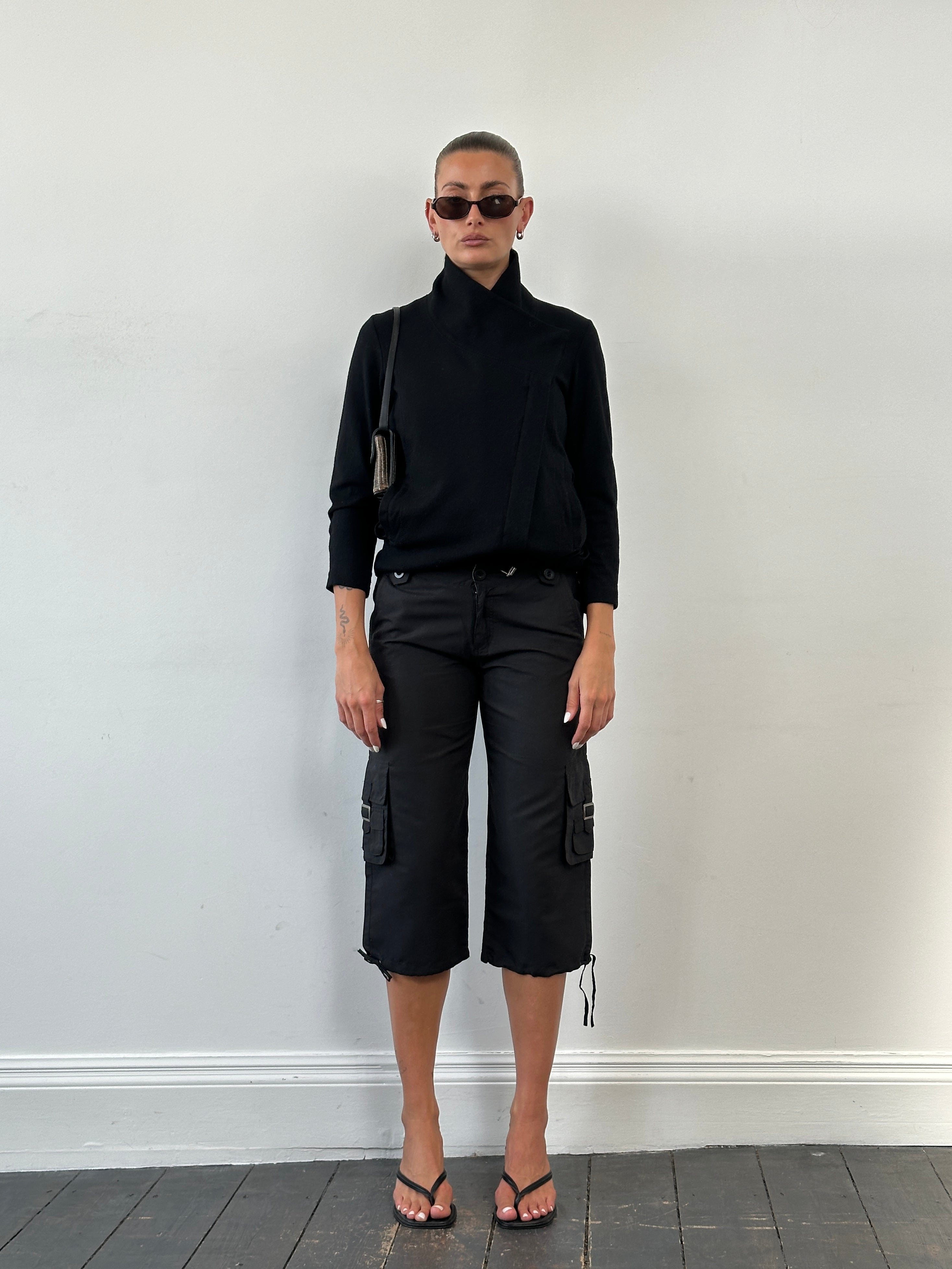 Helmut Lang asymmetric high neck wool belted jacket in black, featuring a modern design and tailored fit.