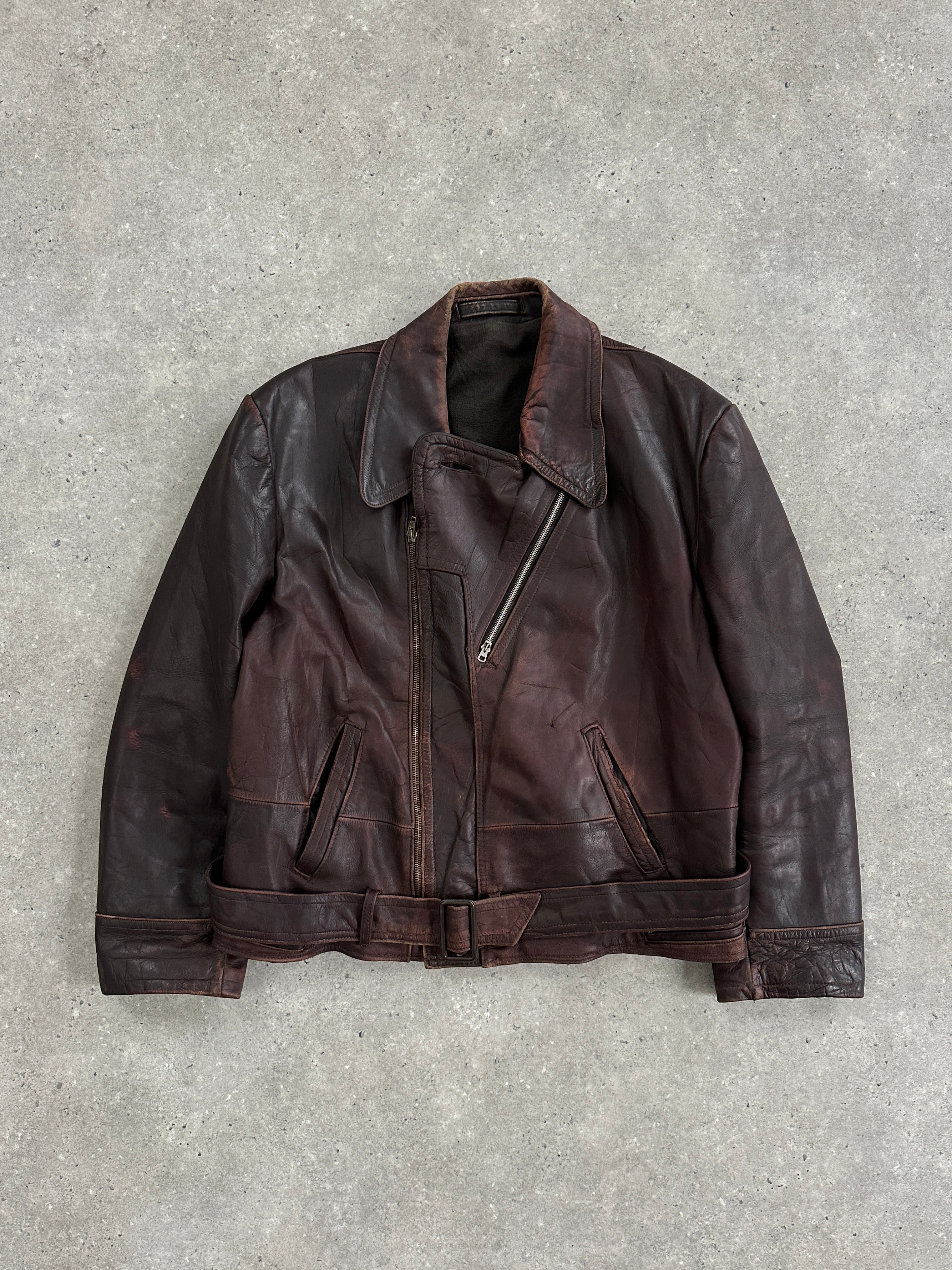 Vintage 1980s distressed leather biker jacket in size L/XL, featuring rugged design and classic motorcycle style.
