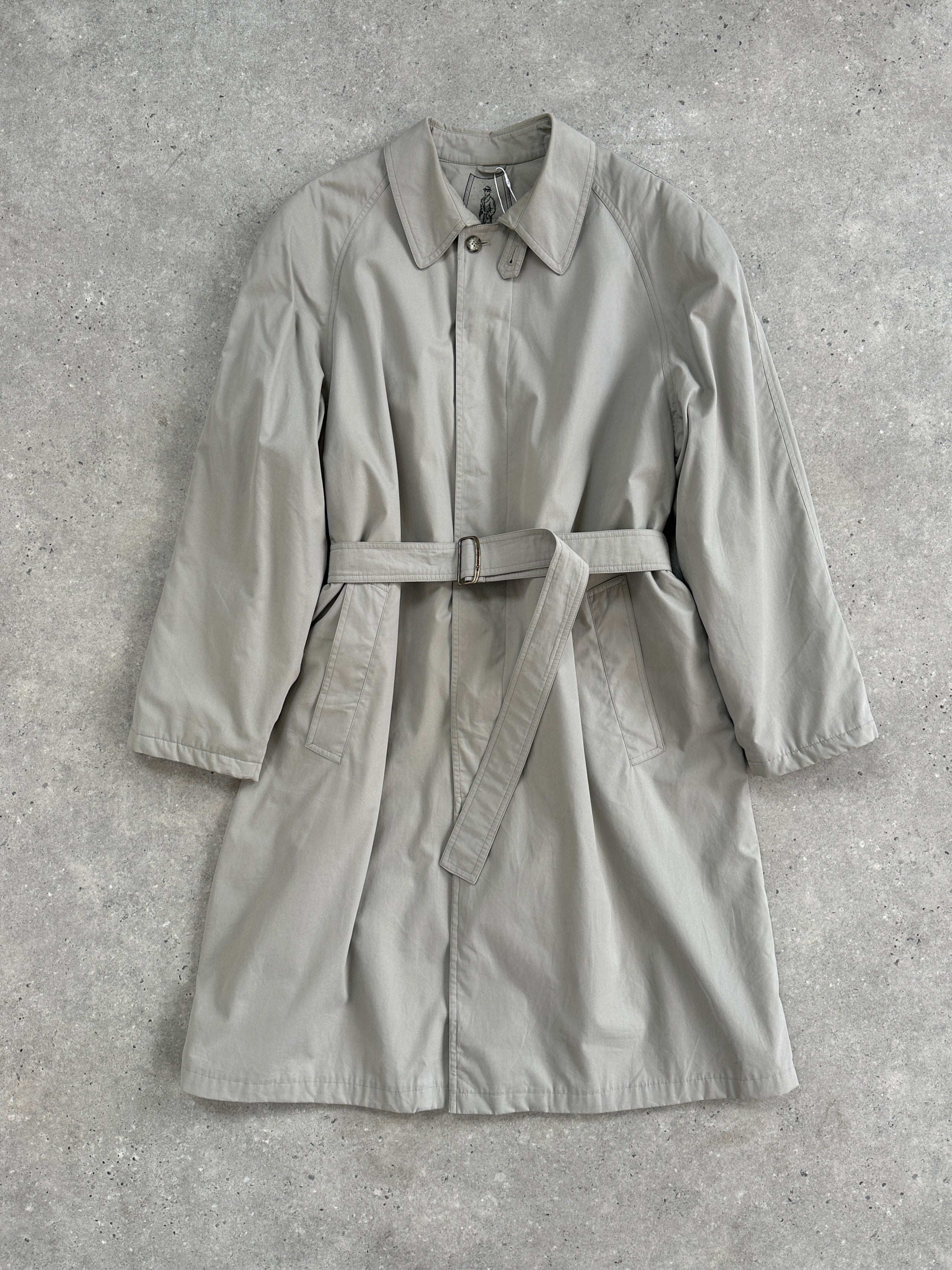 Vintage Italian vintage trench coat with concealed placket, belted design, in XL size, showing classic style and fabric details.