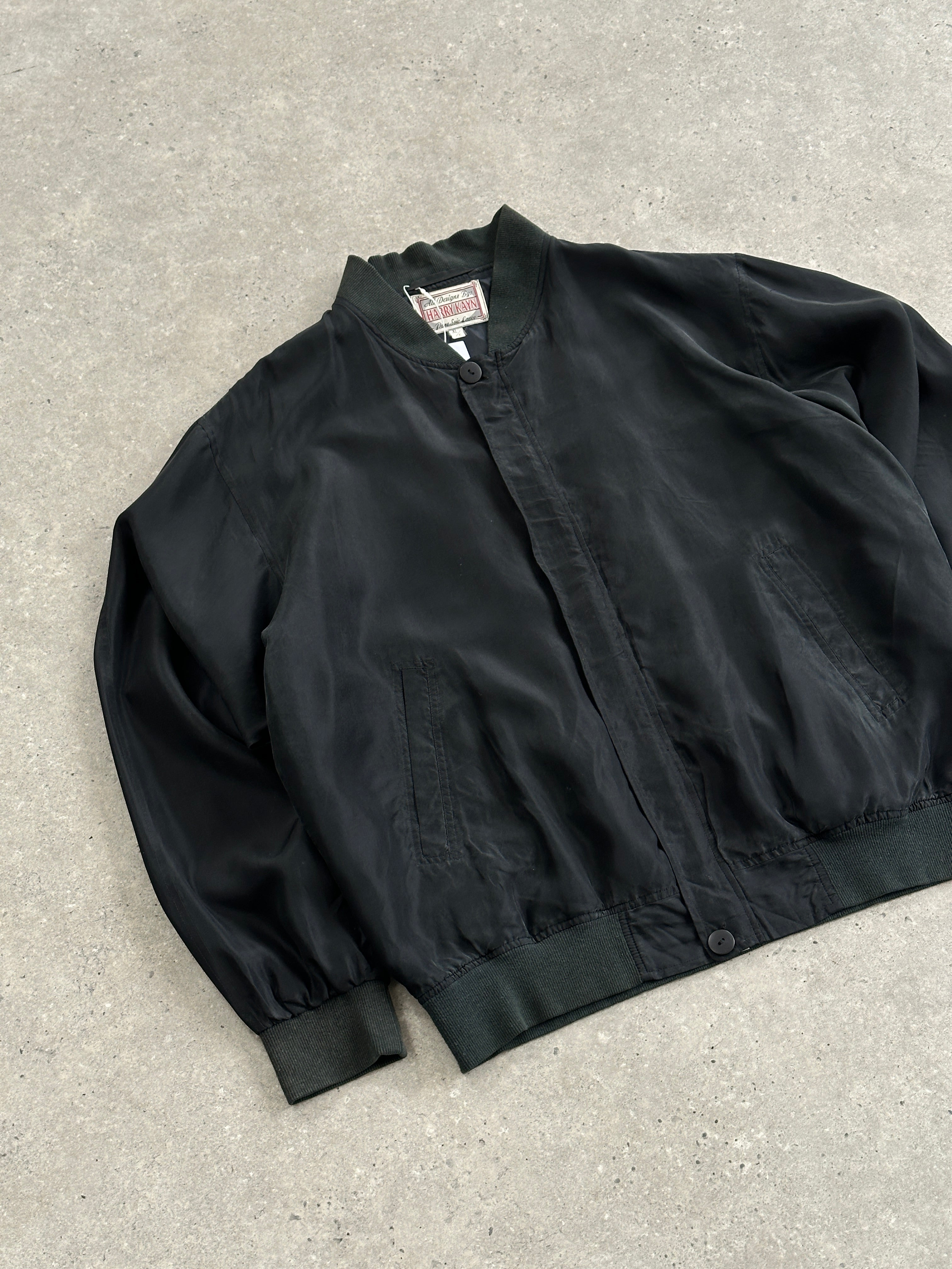 Vintage pure silk bomber jacket in XL, featuring a classic design with a smooth, shiny finish and ribbed collar.