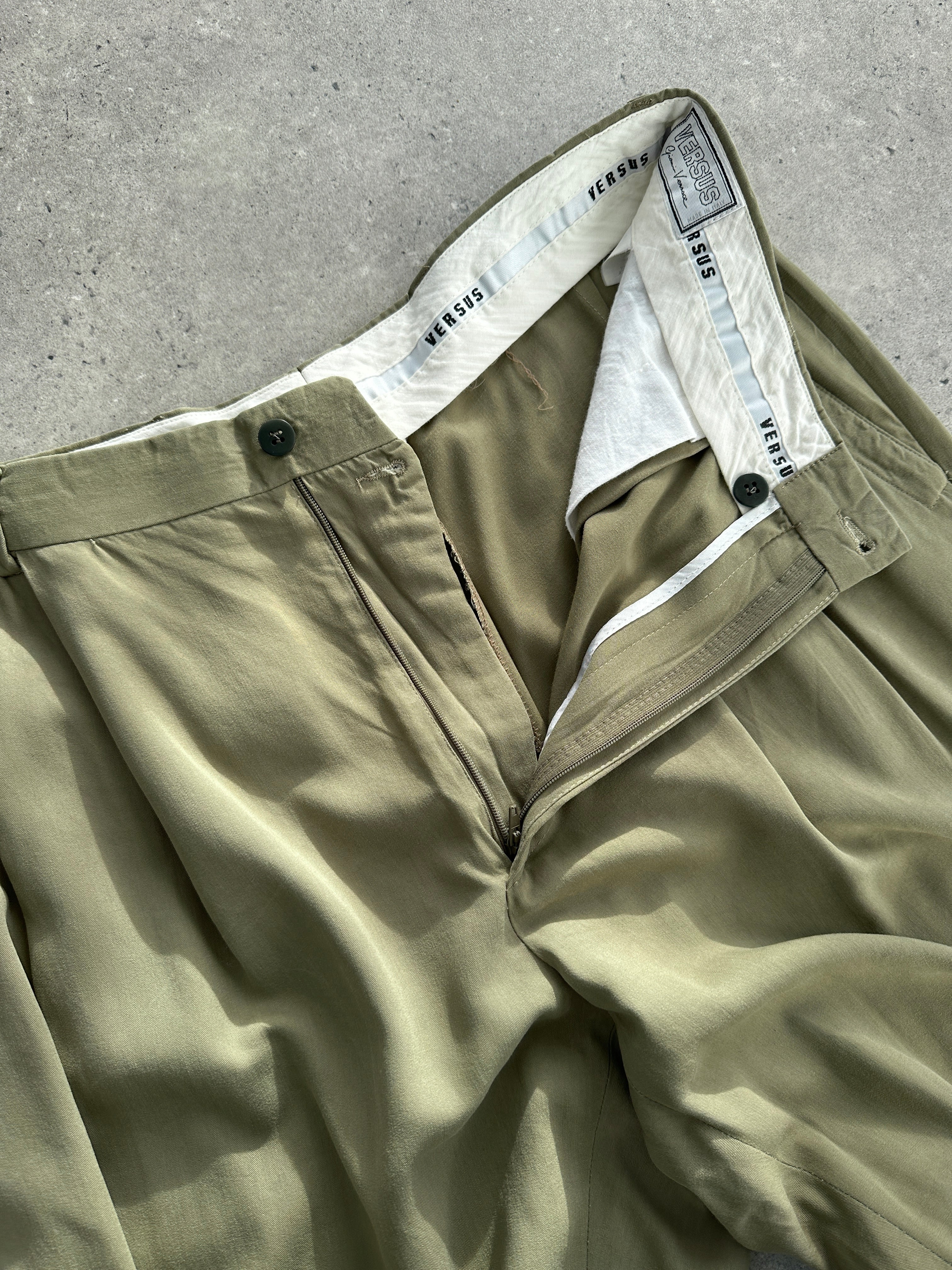 Versace Versus silk high-waisted straight leg trousers in black, featuring tailored fit and sleek design, size W32.