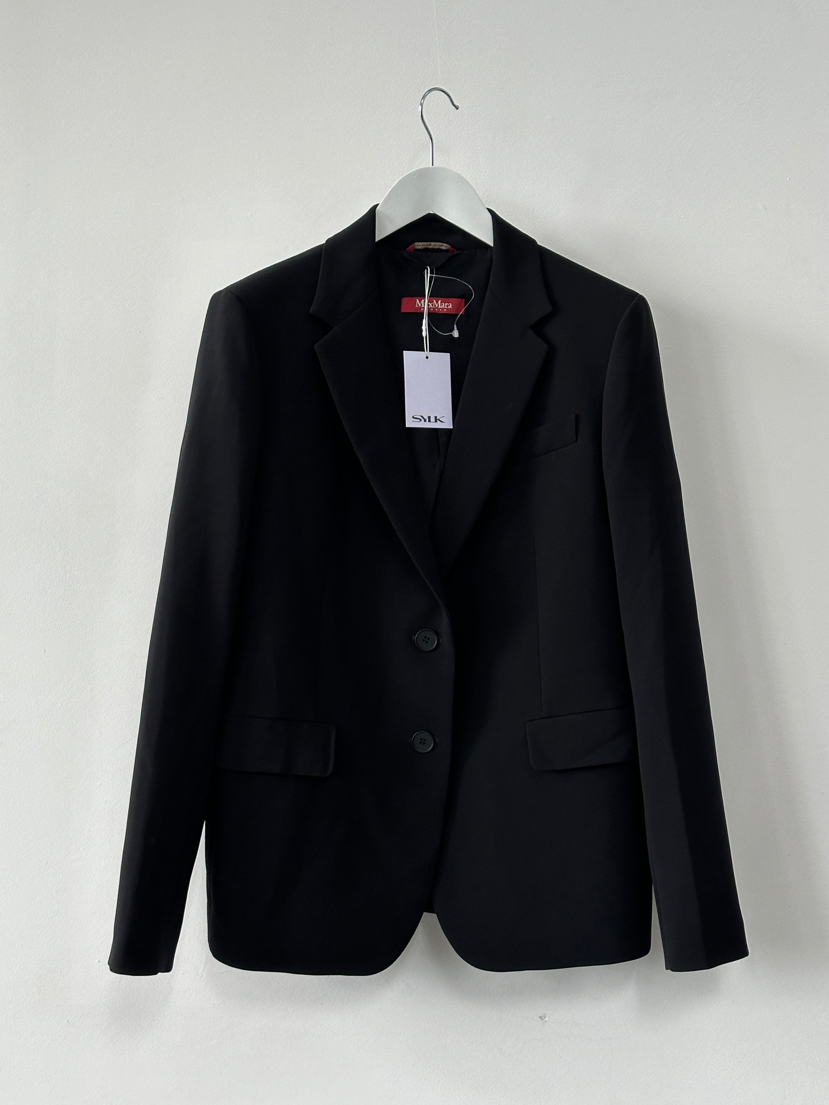 Max Mara Studio single-breasted blazer in tailored black fabric, displayed on a hanger, size M/L.