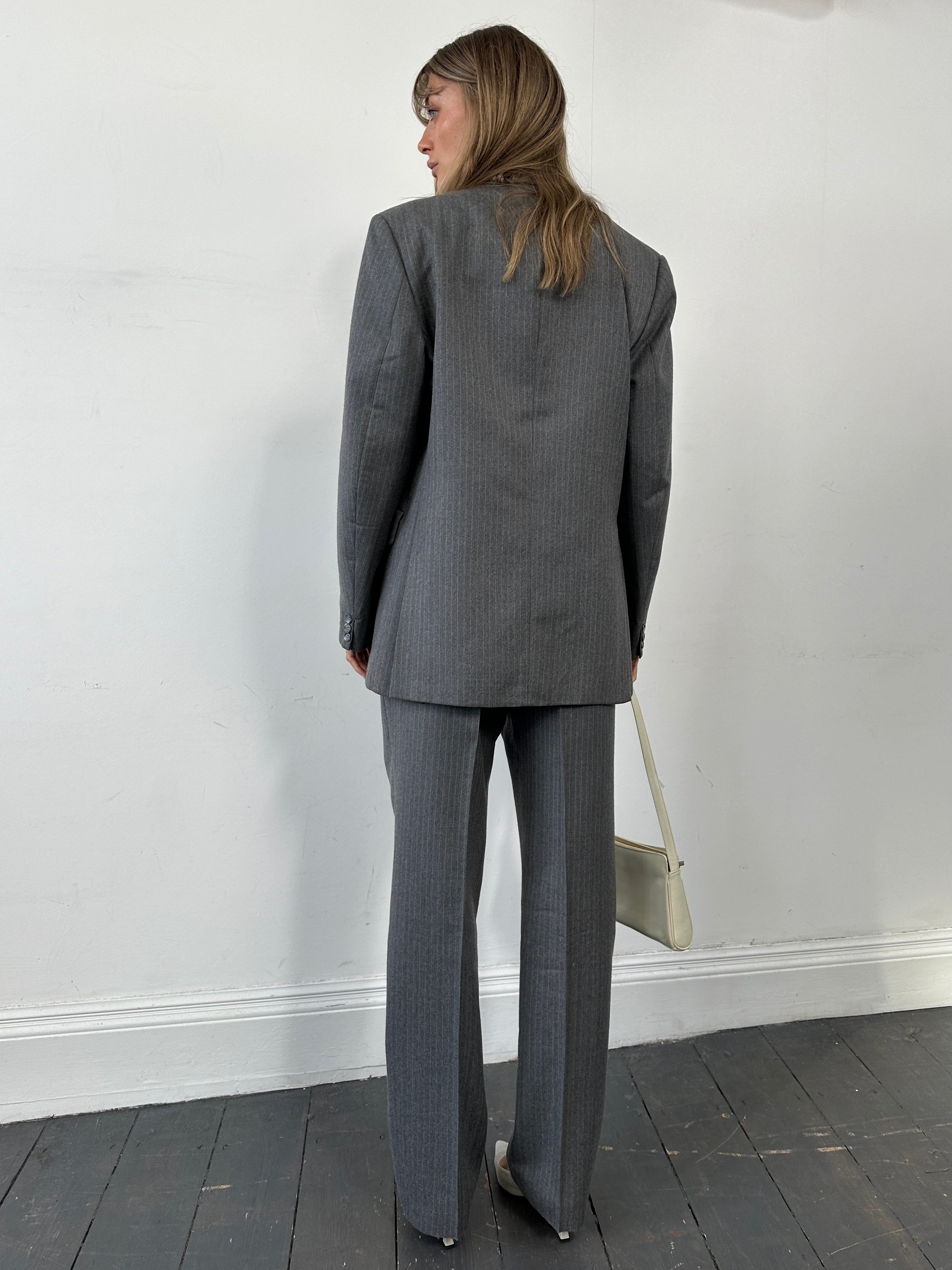 Vintage British vintage pinstripe wool jumpsuit, single-breasted suit in size 42R/W32 with classic tailored fit.