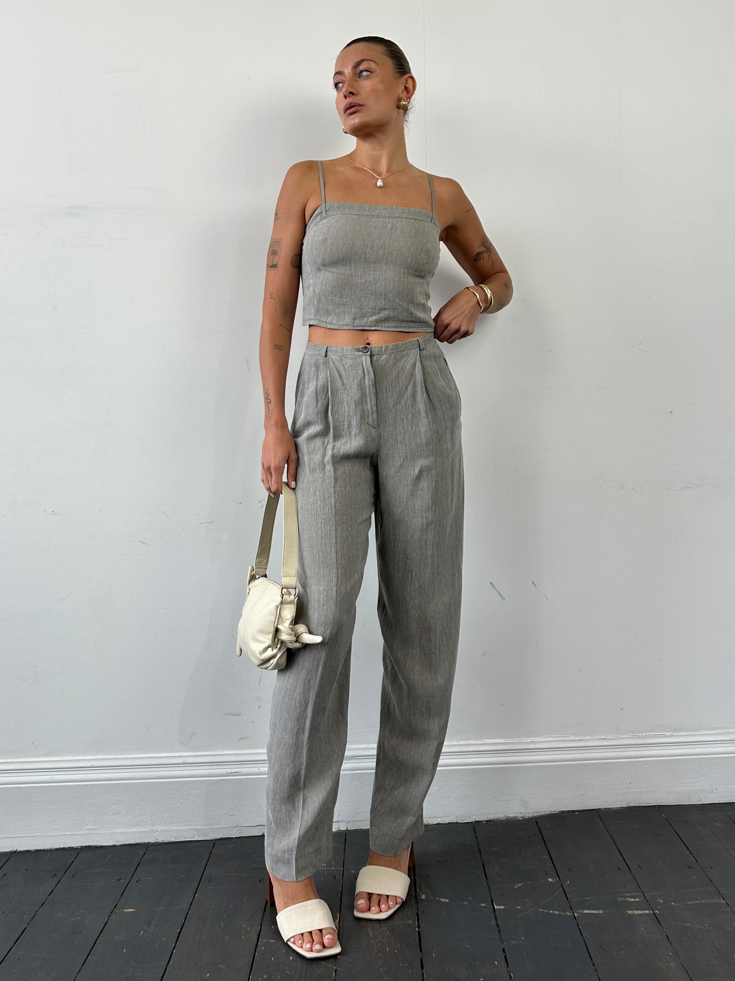 Mani linen two-piece top and trouser co-ord set, featuring stylish beige trousers and matching sleeveless top, casual summer wear