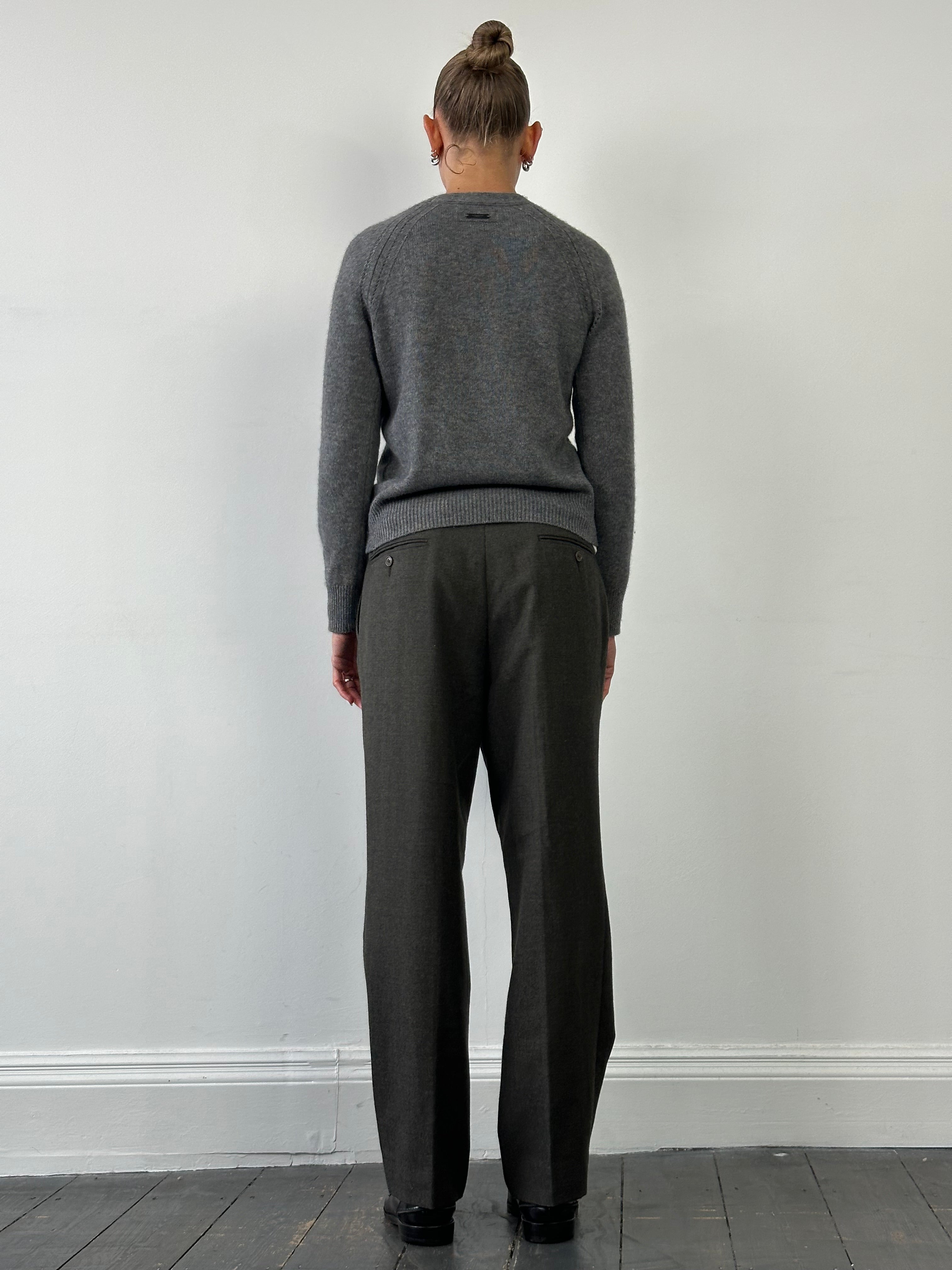 Vintage Italian pure wool tailored trousers in size W32, featuring classic design and fine craftsmanship.
