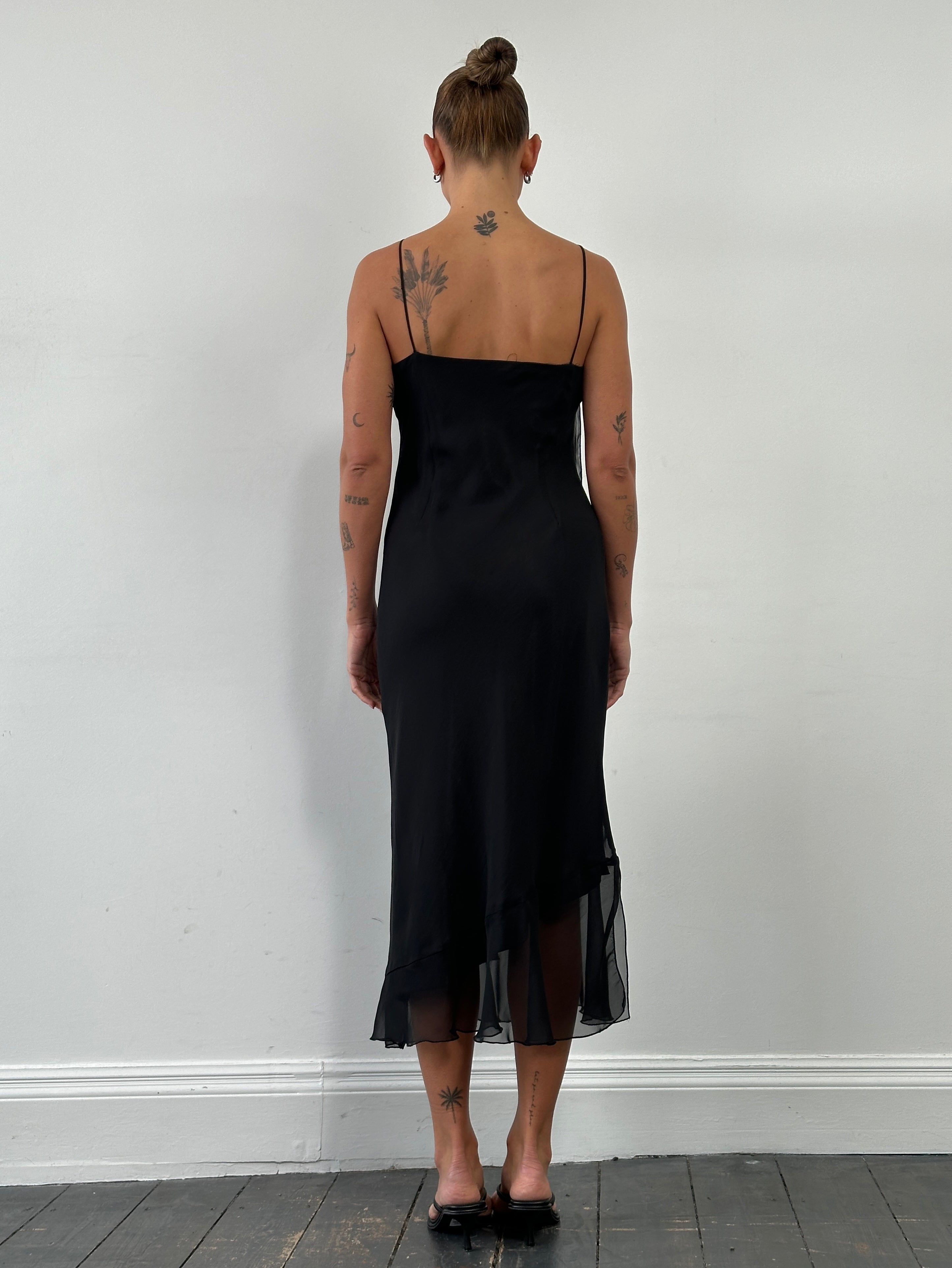 Vintage asymmetric sheer maxi slip dress in size M featuring flowing fabric and elegant drape, perfect for stylish evening wear.