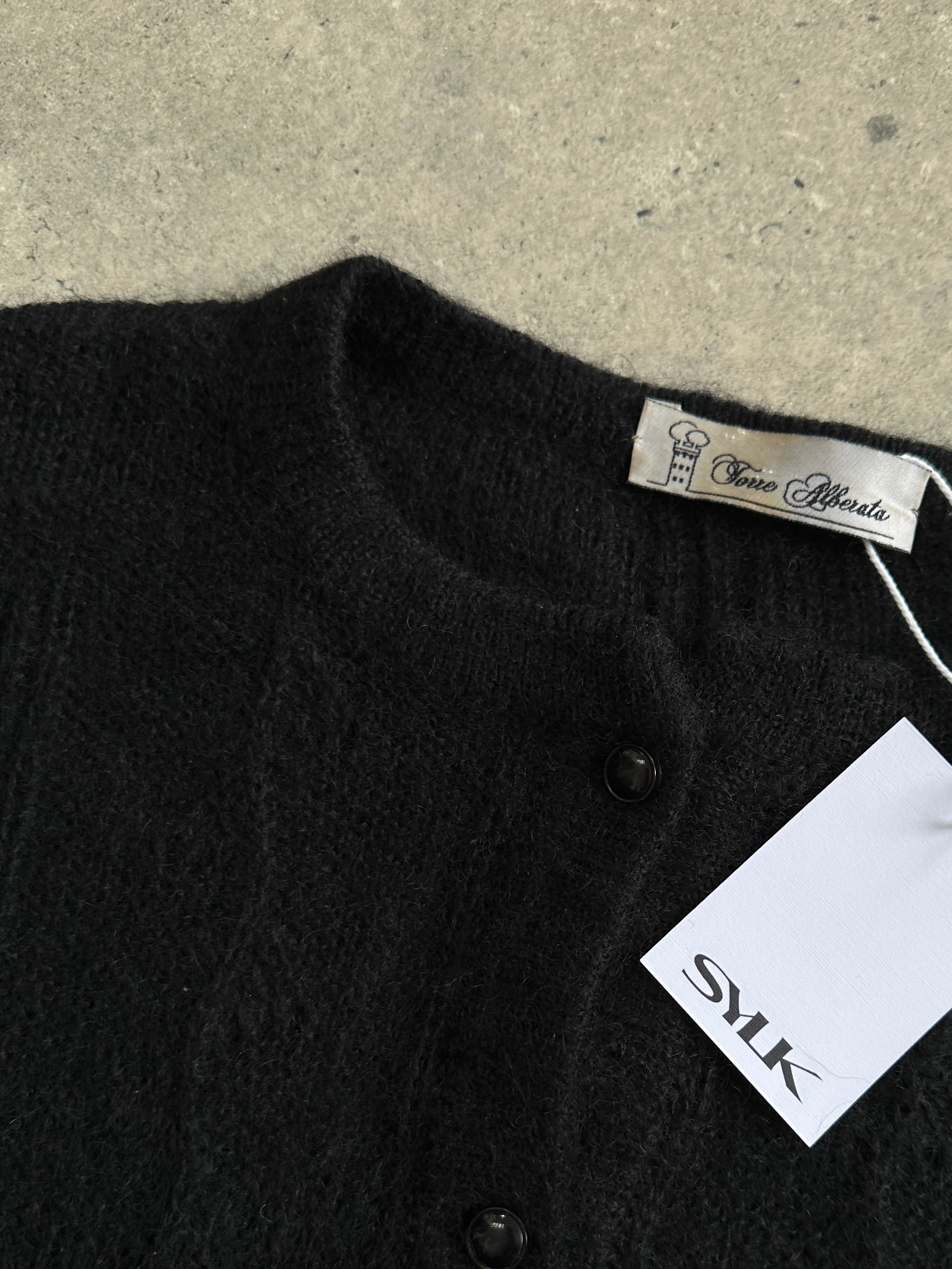 Italian vintage mohair wool cardigan in size M/L, featuring a soft, textured knit with a classic design and cozy fit.
