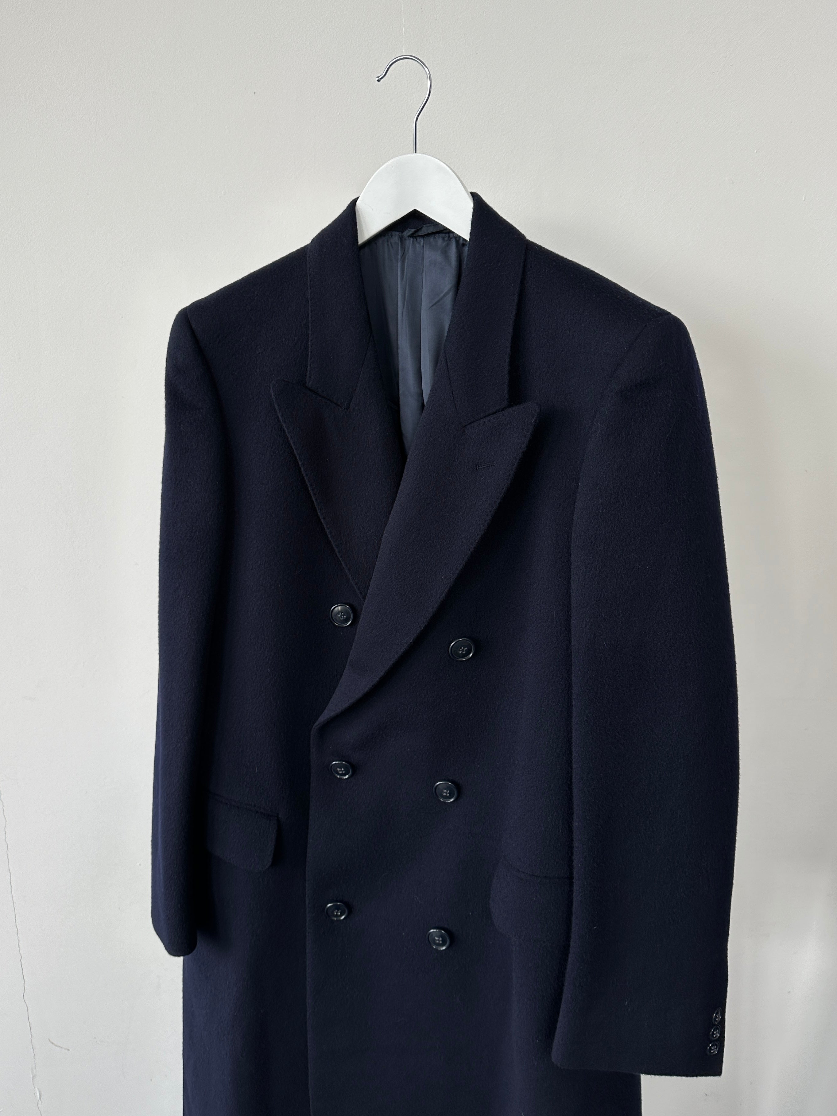 Vintage pure virgin wool double-breasted coat in M/L size, featuring classic design and tailored fit, displayed on a neutral background.
