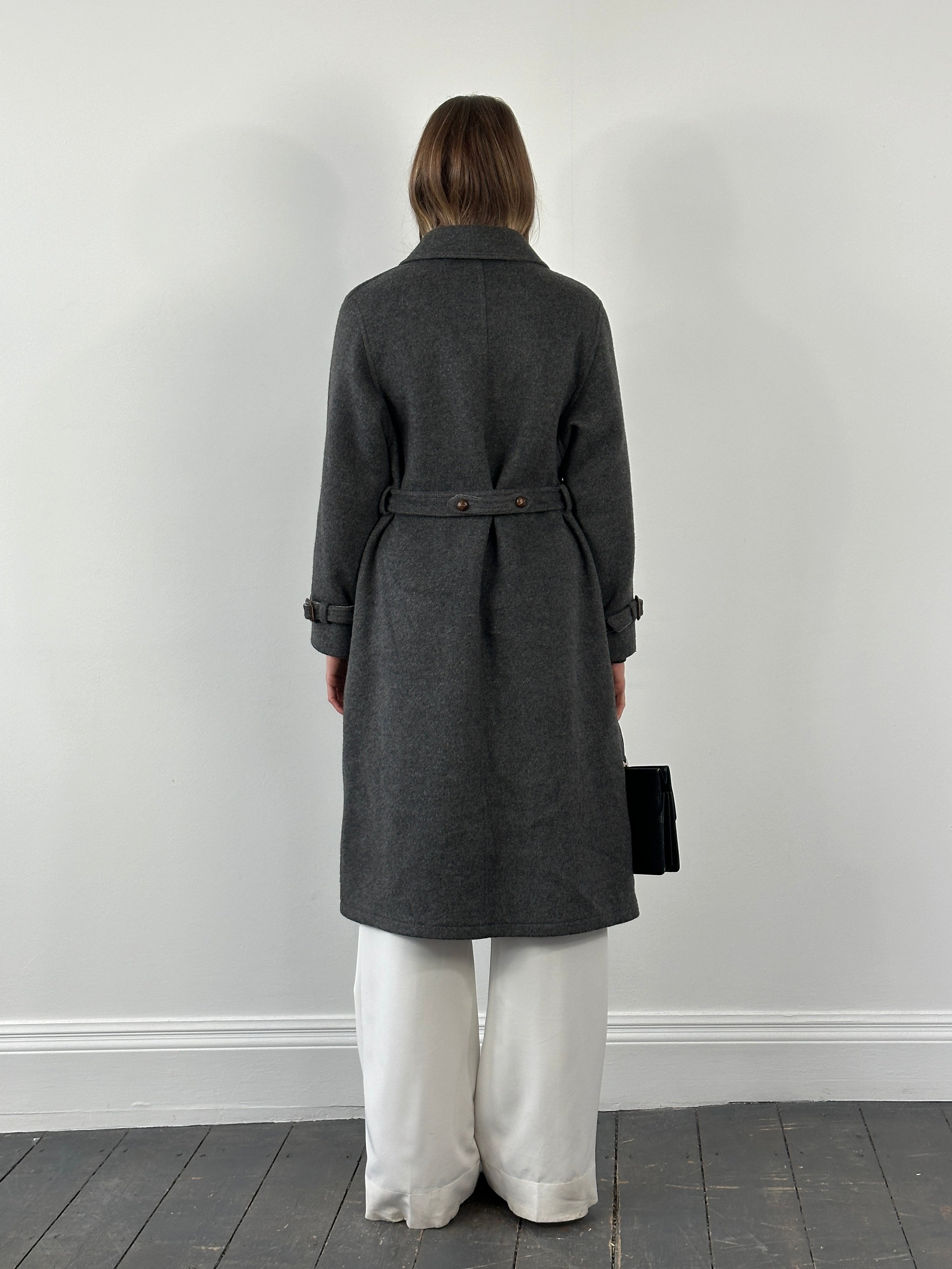 Vintage 1980s wool belted coat with concealed placket, featuring classic design and tailored fit in size S/M.