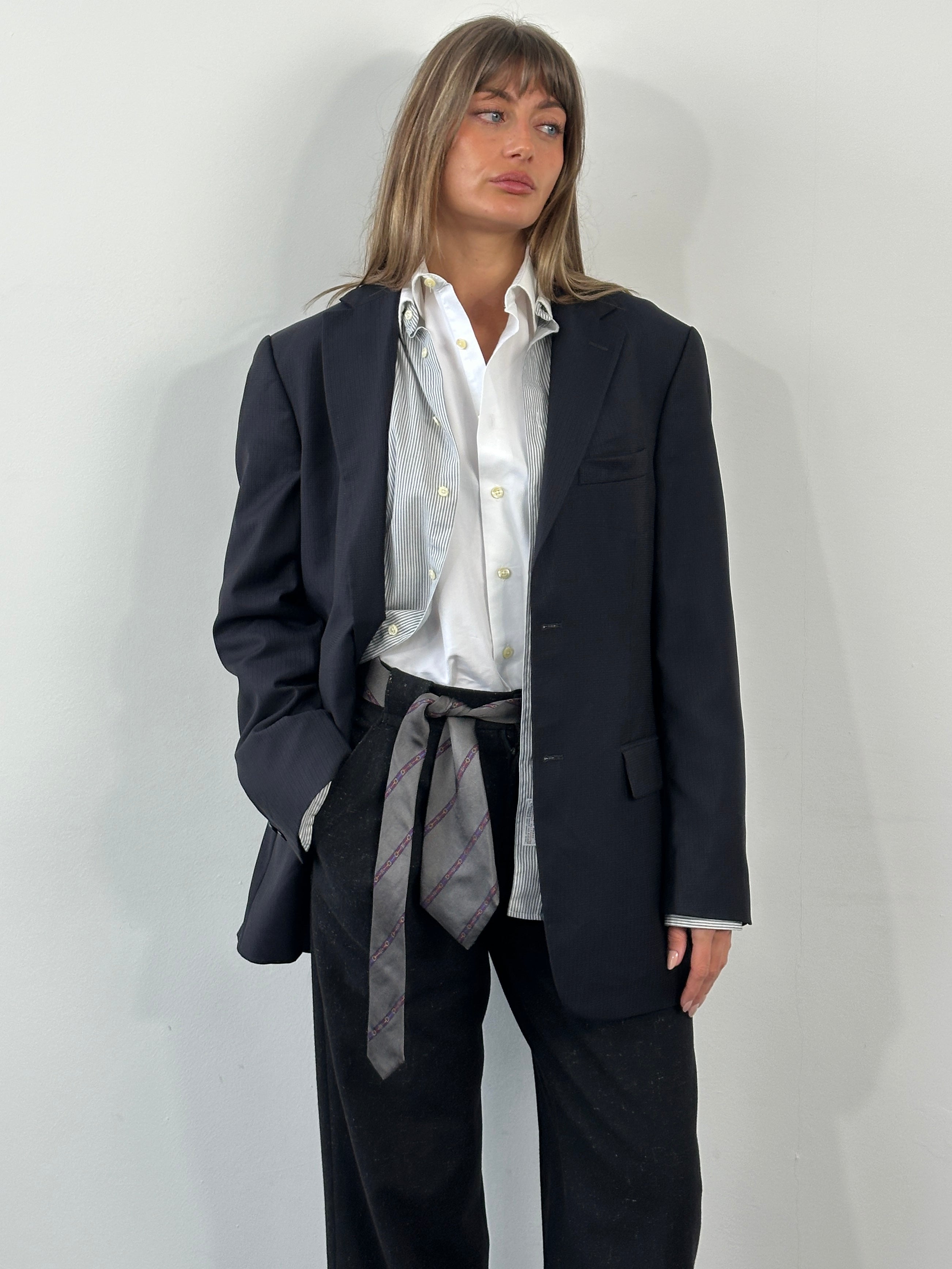 Loro Piana 1990s pure wool single-breasted blazer in size 42R/L, tailored fit with classic lapels and button closure.