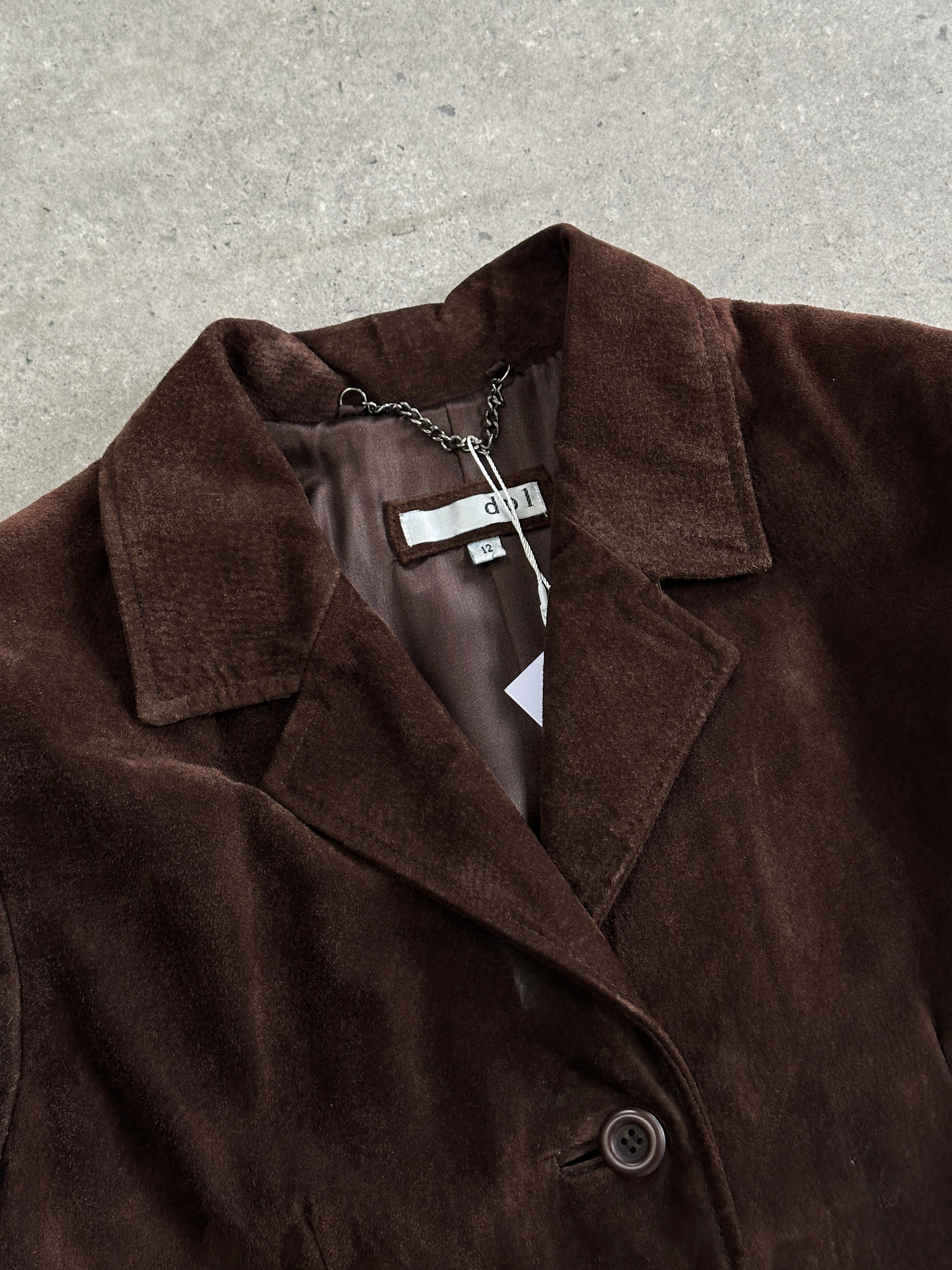 Vintage suede trench coat jacket in size large, featuring classic design and stylish detailing.