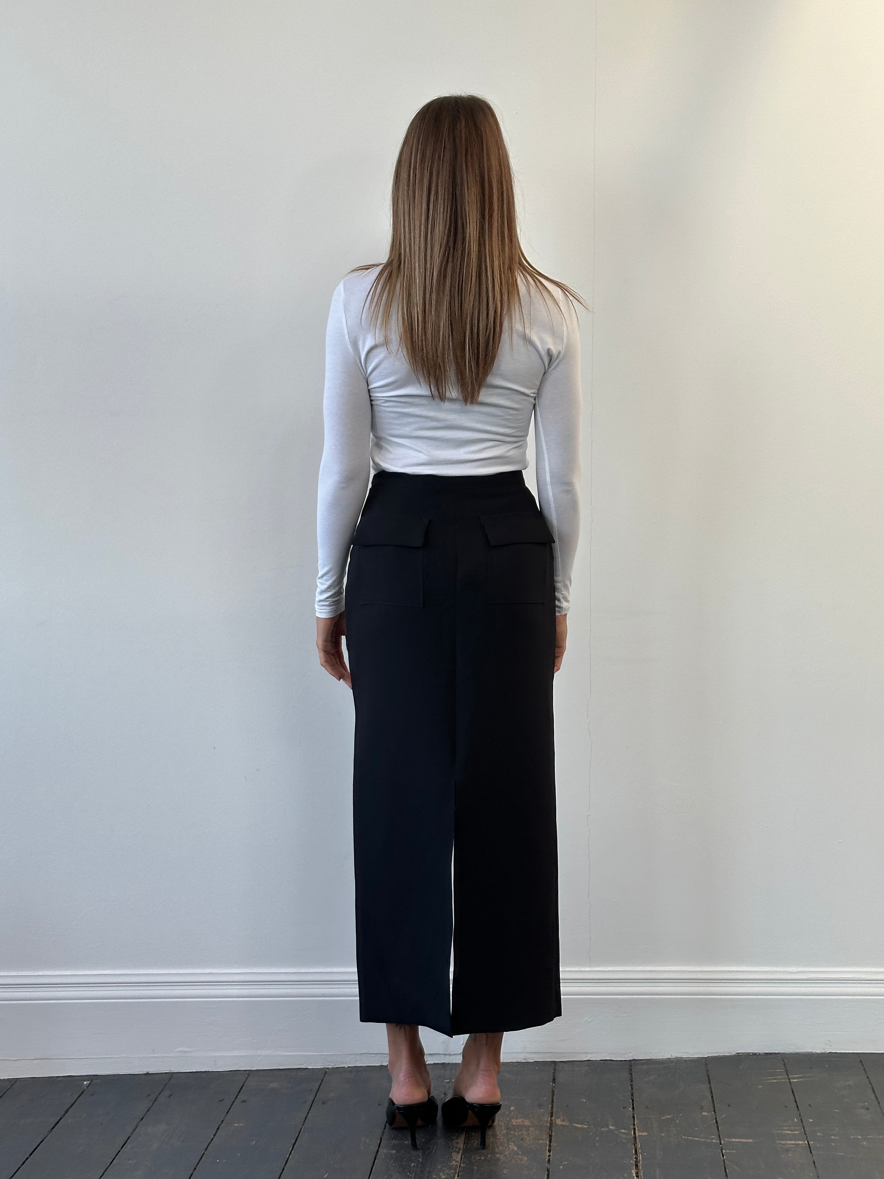 Vintage Italian 1990s maxi skirt in W26 with flowy fabric and vintage design, perfect for retro-inspired fashion.