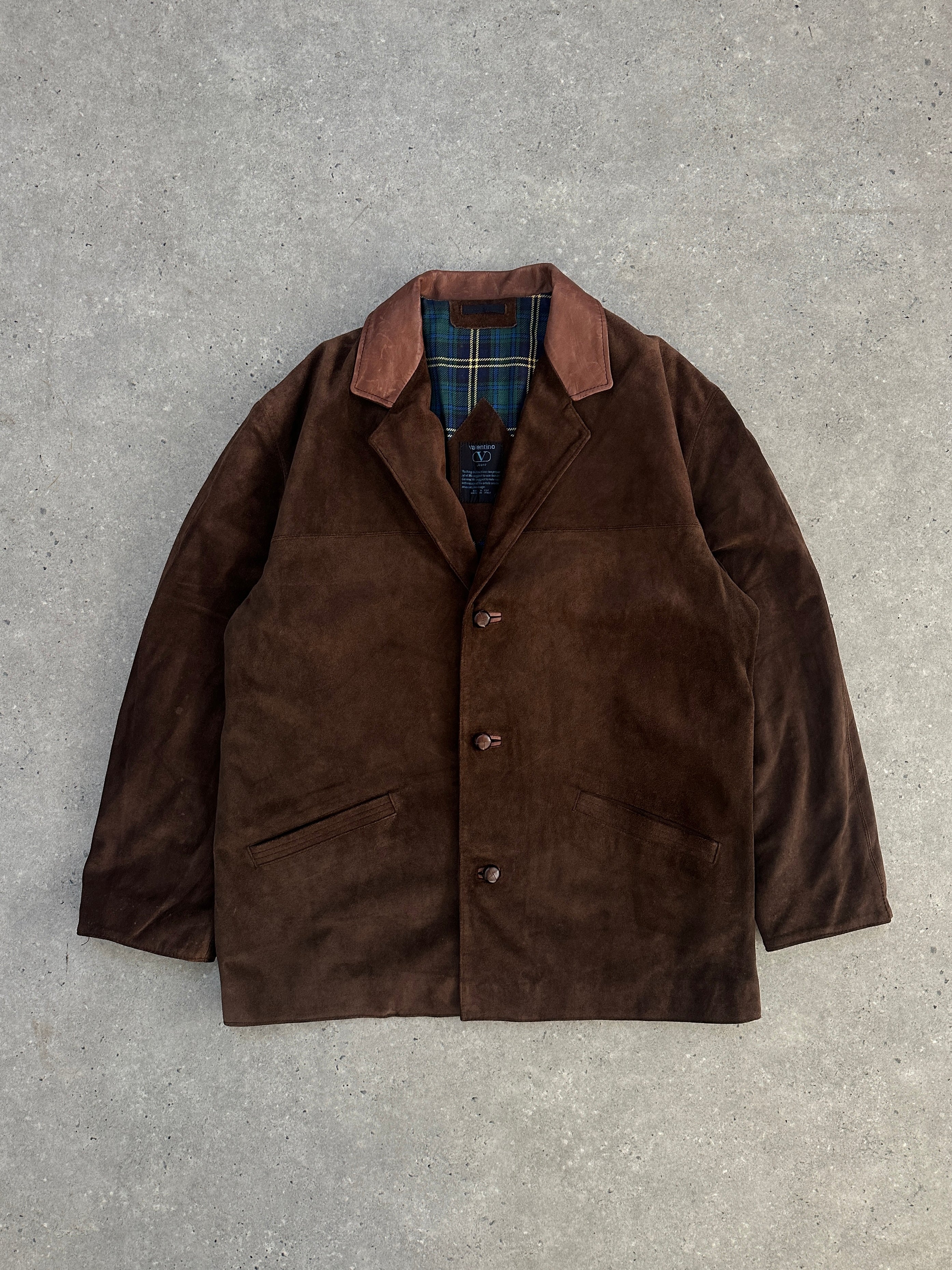 Valentino XL suede blazer jacket, stylish leather jacket featuring a tailored fit and classic design, displayed on a hanger.