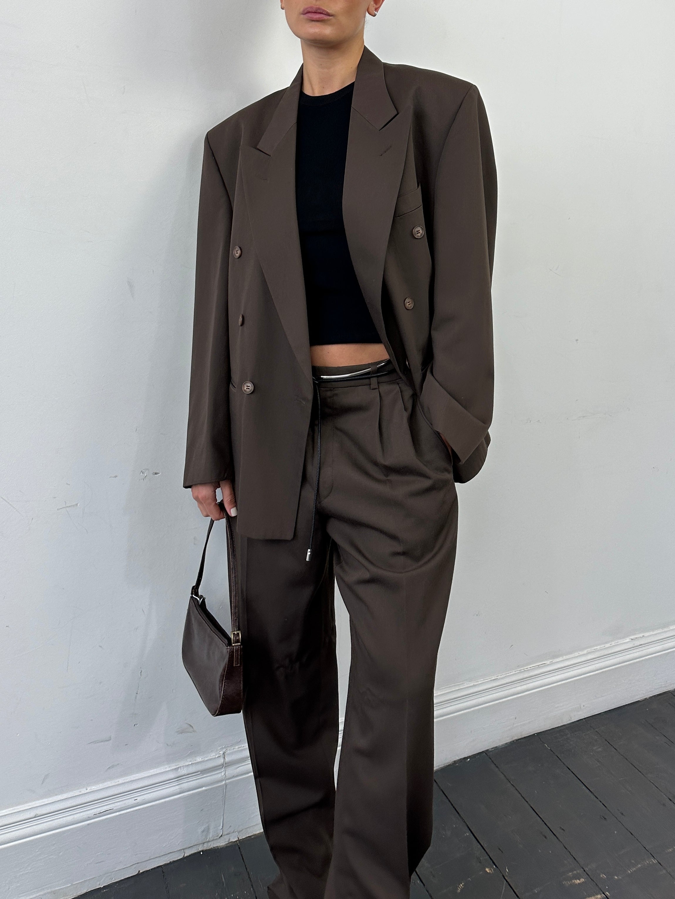Vintage double-breasted suit jumpsuit in size 40R/W32, featuring a classic tailored design and vintage style.