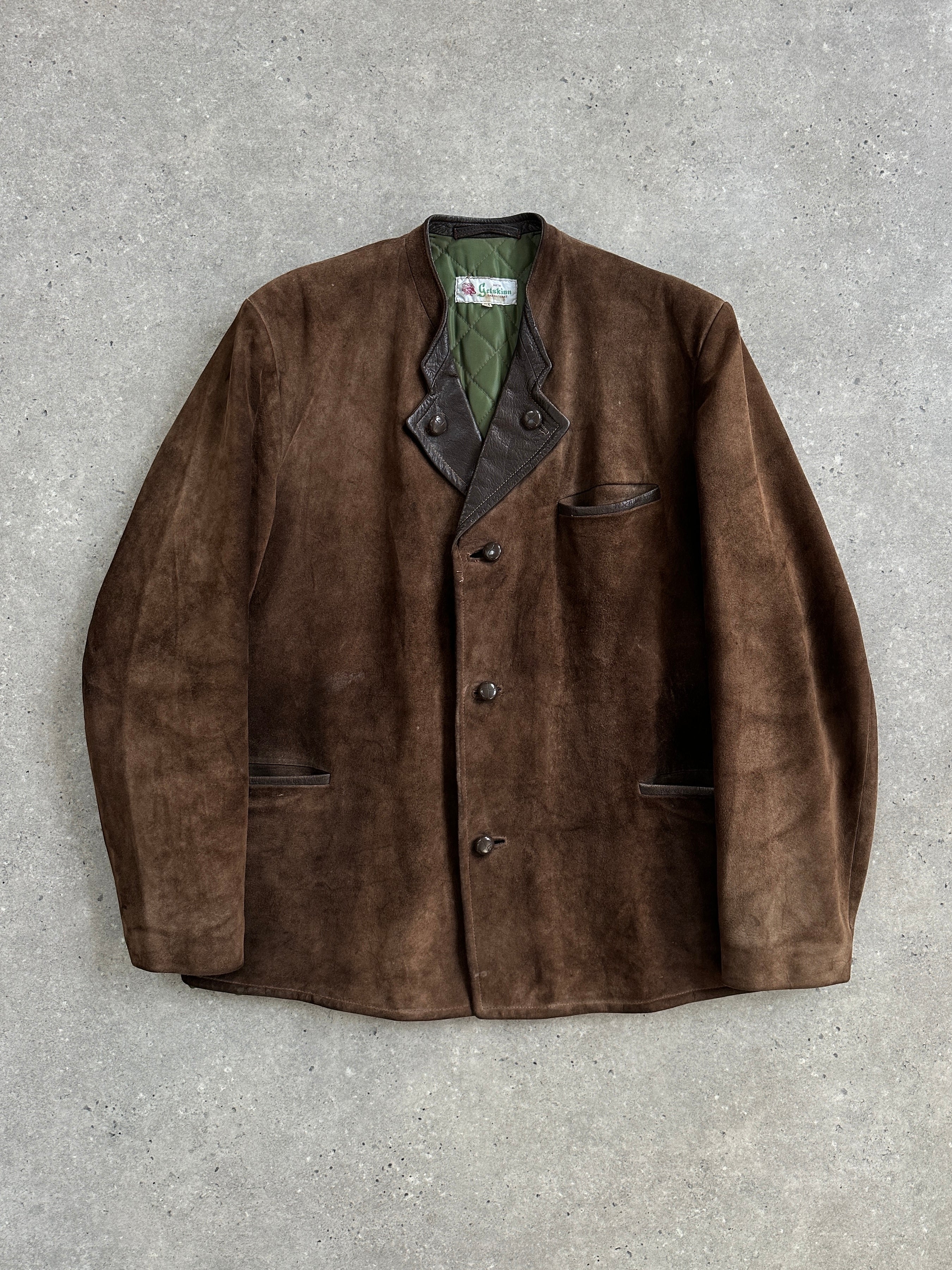 Vintage 1970s XL suede leather jacket with classic design, soft texture, and detailed stitching.