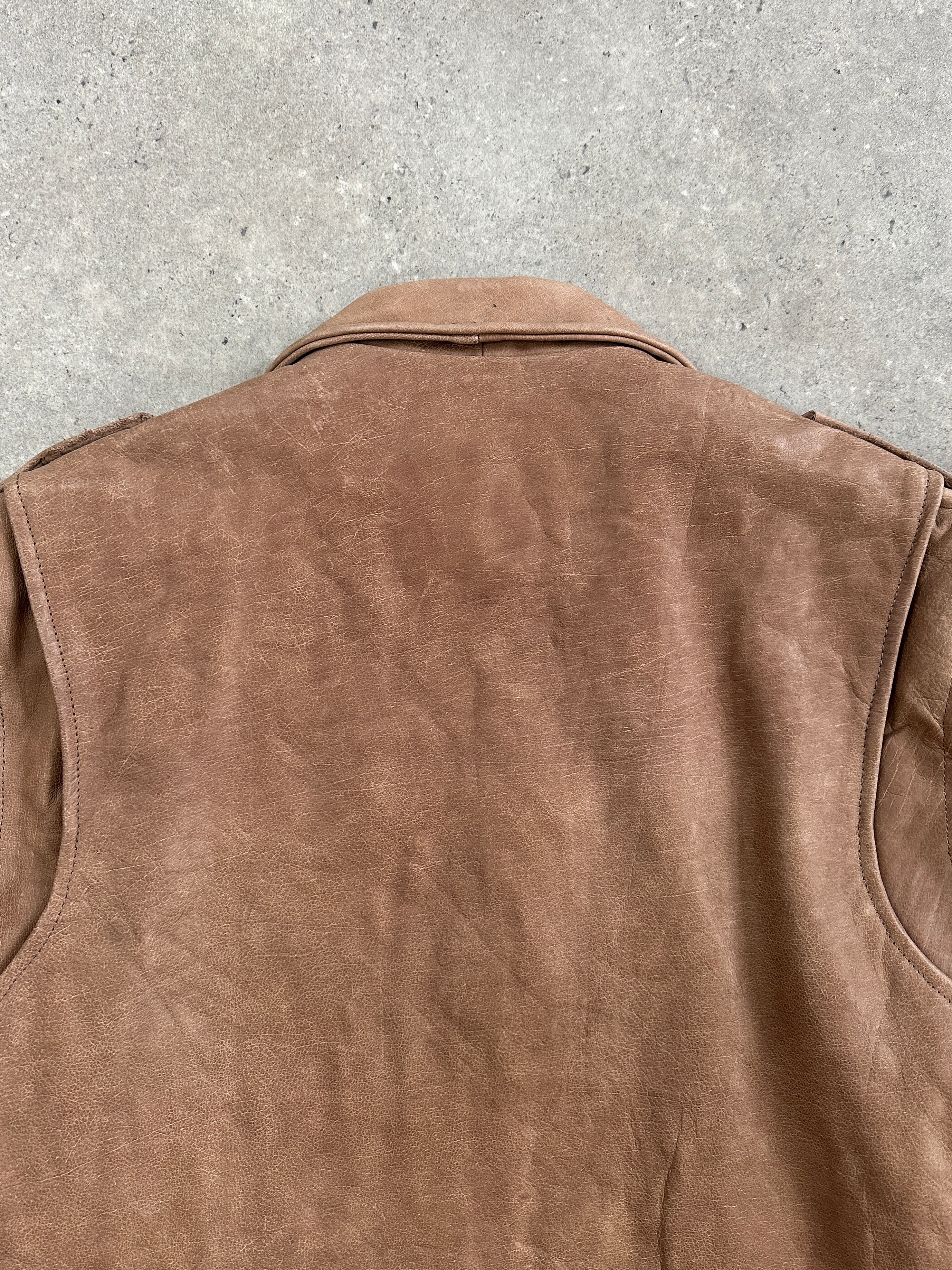 Vintage 1990s leather biker jacket in XL, featuring classic rugged design and distressed leather for a vintage-inspired look.
