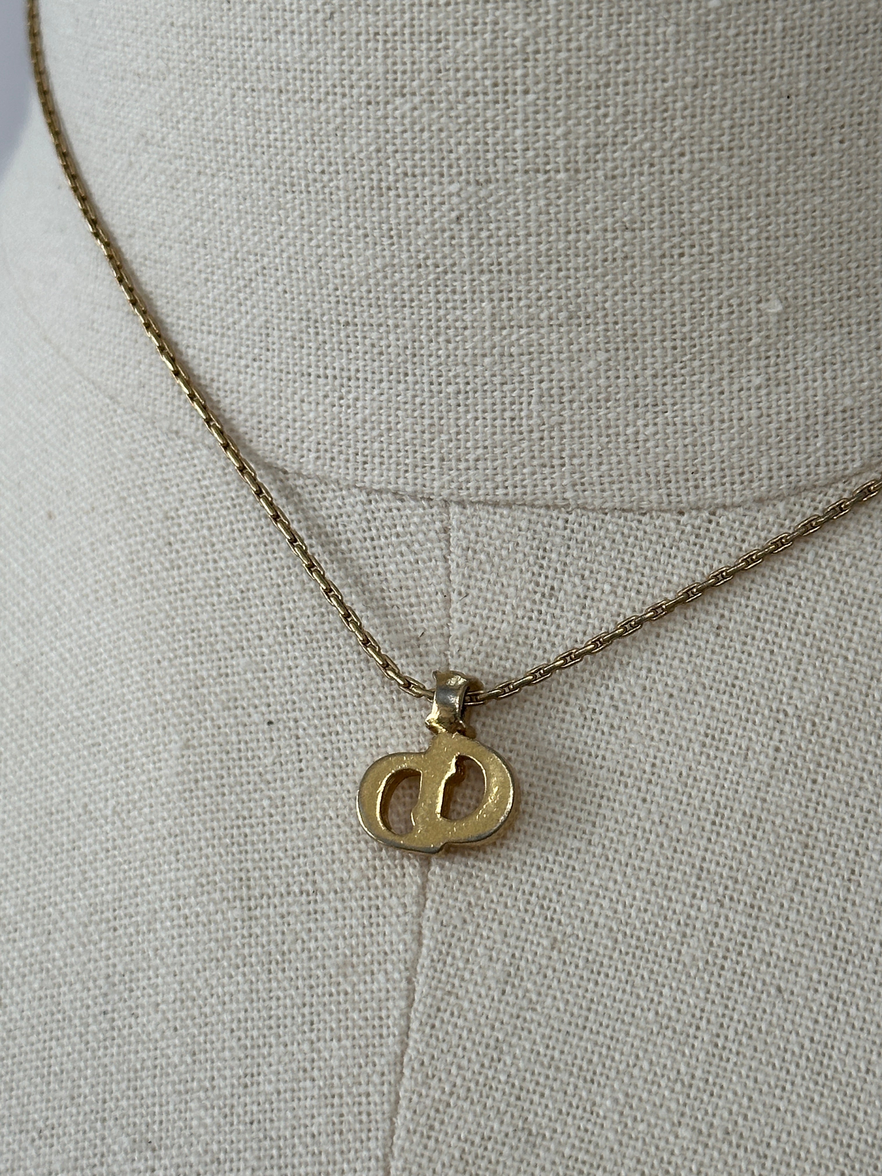 Christian Dior 1990s gold plated CD logo pendant necklace, 16-inch chain with elegant designer jewelry detail.