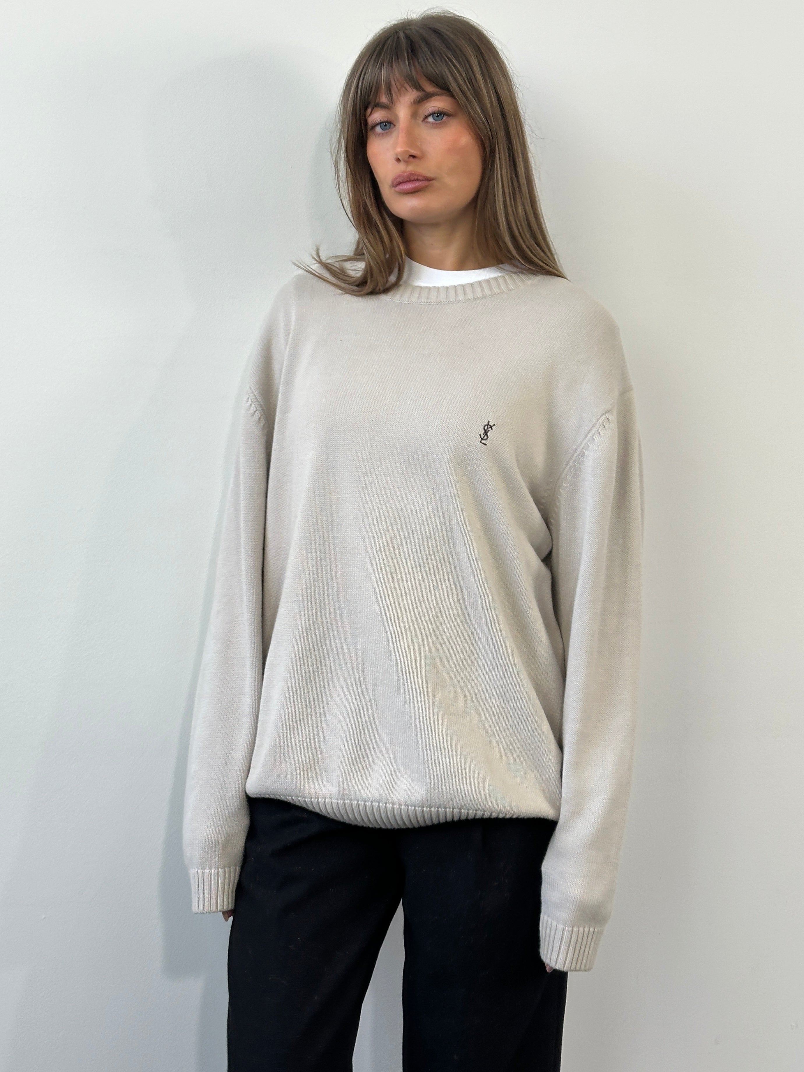 Yves Saint Laurent Pour Homme 1990s XL pure cotton knitted logo jumper, cream color, close-up of the textured fabric and embroidered logo.