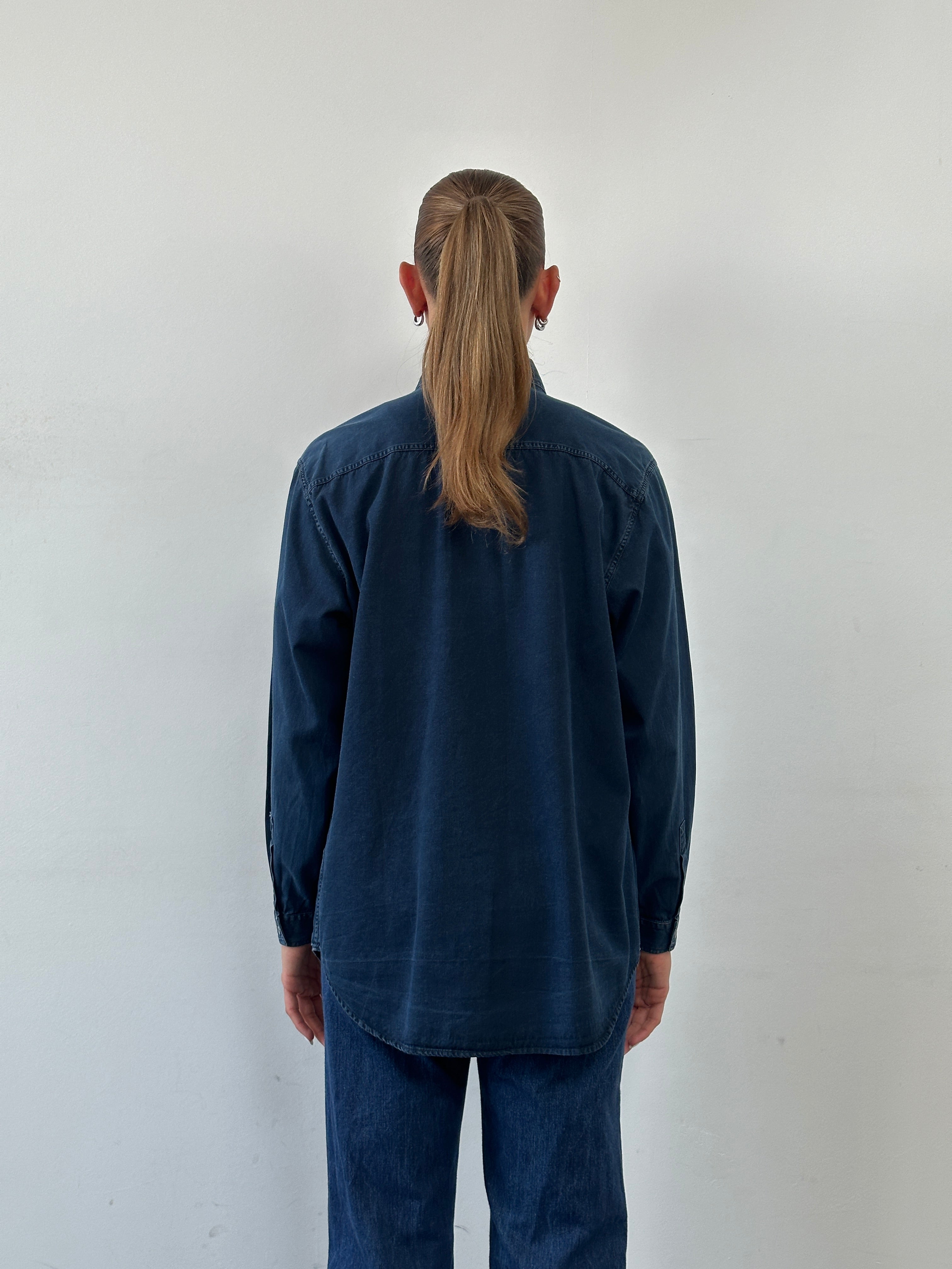Armani Jeans denim logo shirt in size L, featuring a classic denim fabric with the Armani logo front detail.
