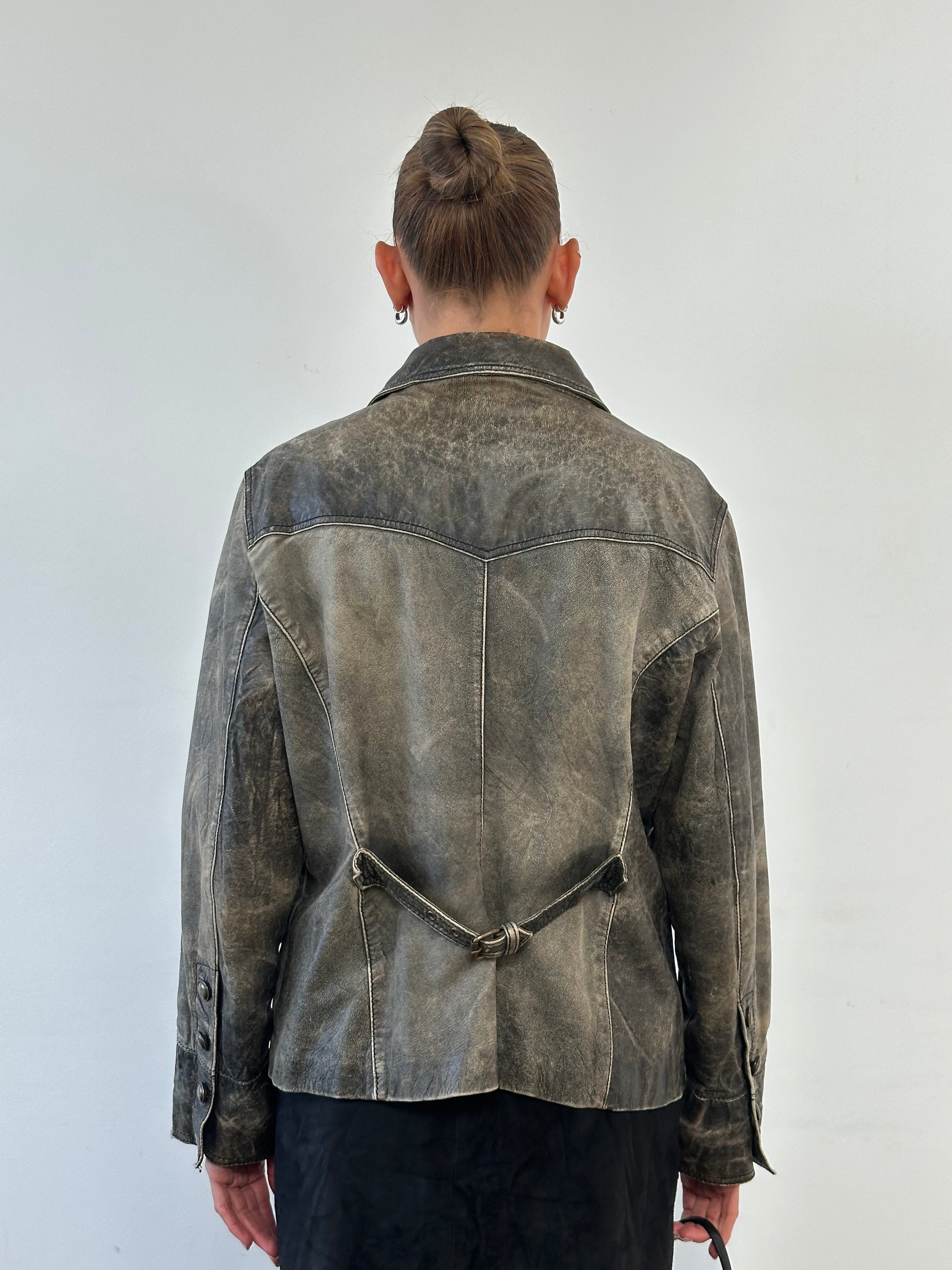 Vintage aged leather blazer jacket in size M, showcasing a classic, rugged style with distressed leather details.