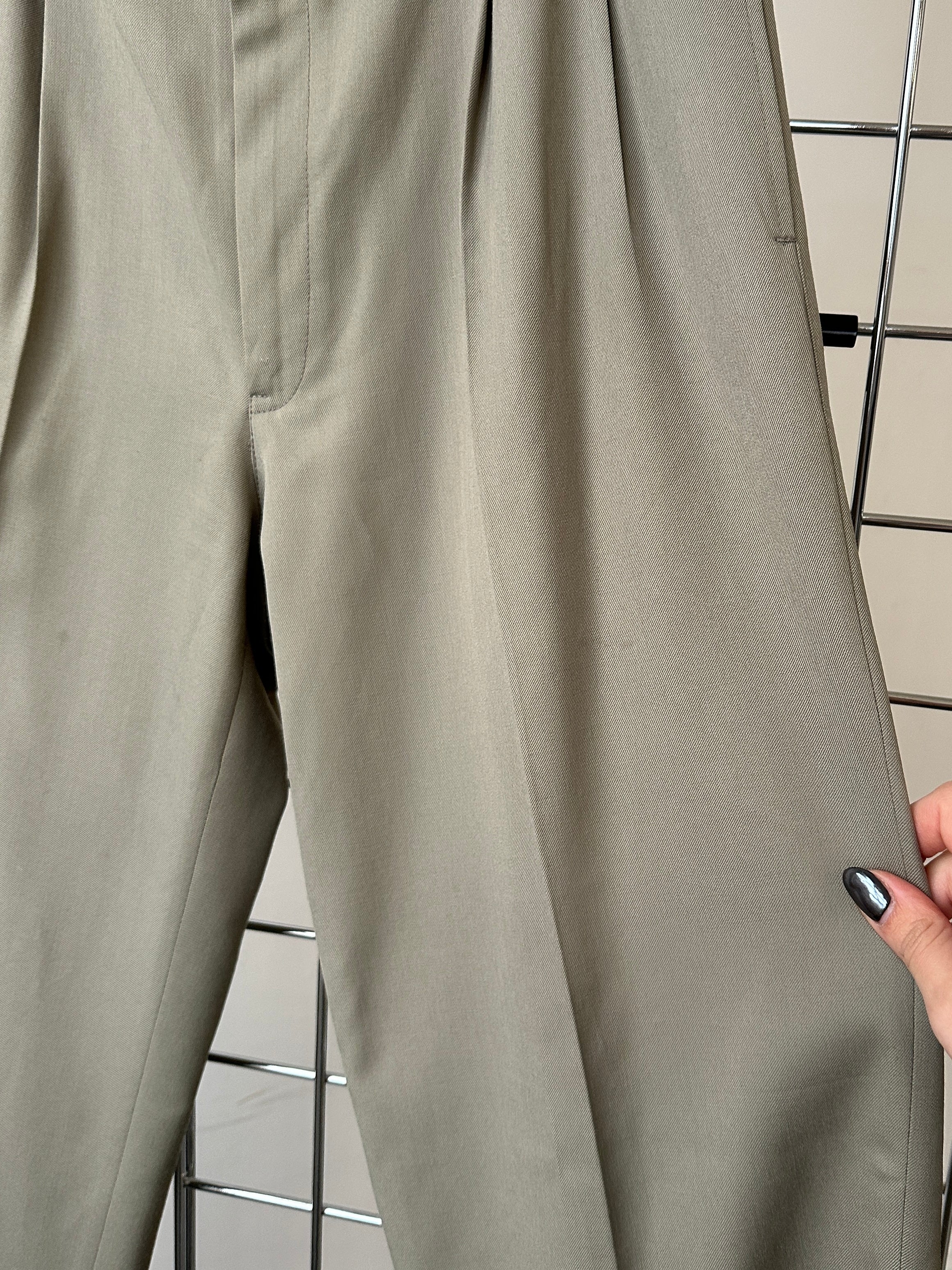 Vintage wool single-breasted jumpsuit in size 40R/W30, featuring a classic tailored fit and vintage style.