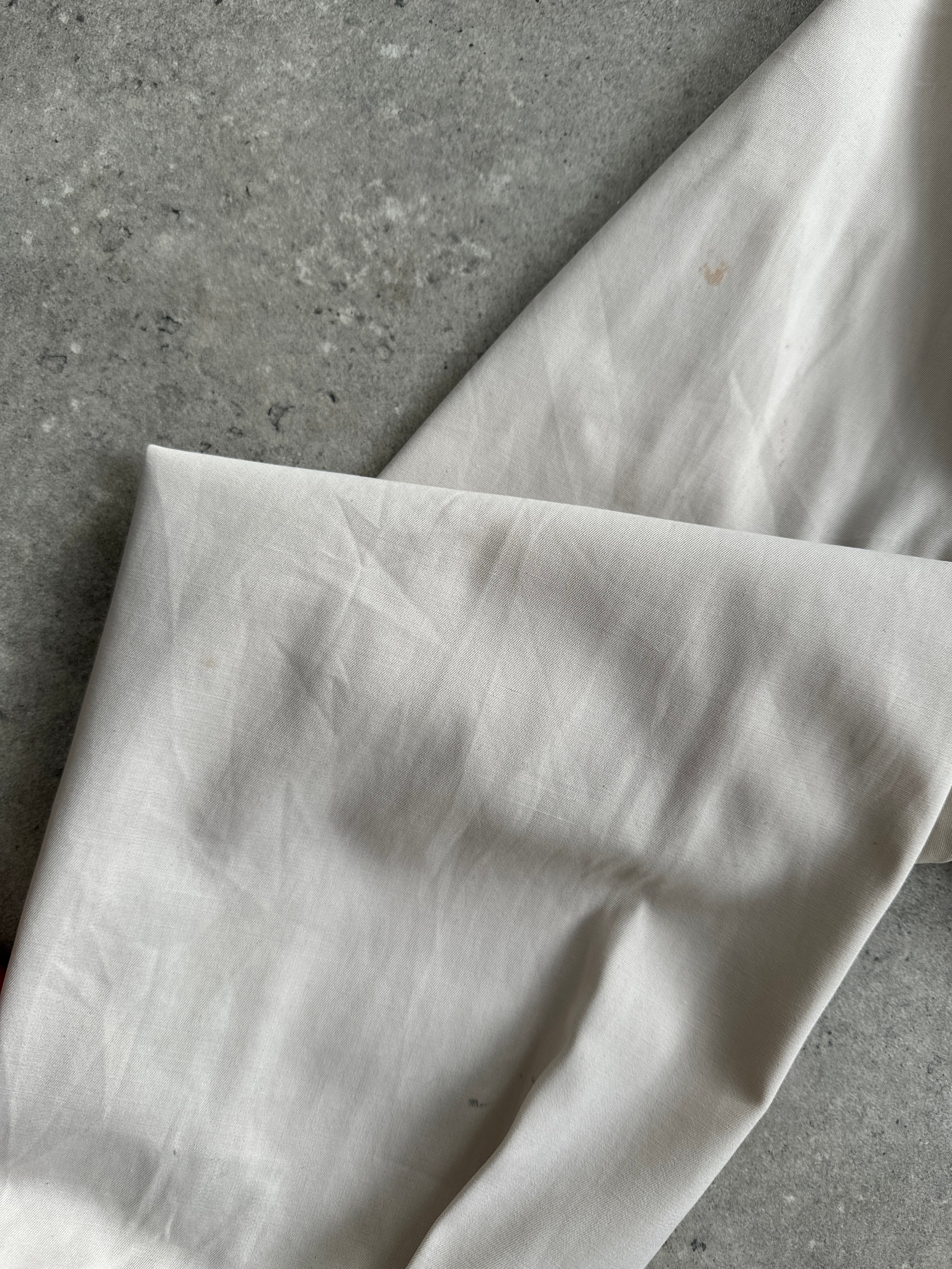 Burberry Nova Check logo bomber jacket in size L, featuring classic check pattern and modern design elements.