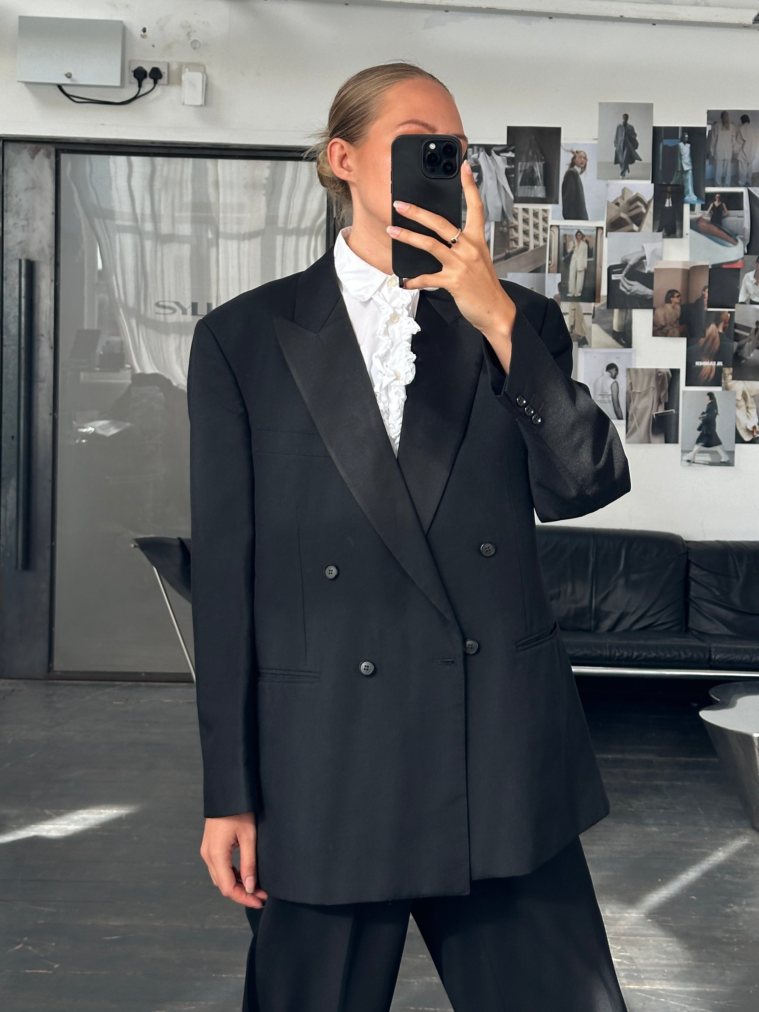 Vintage British 1980s pure wool double-breasted tuxedo blazer in size 44R/XL, showing classic lapels and tailored fit.