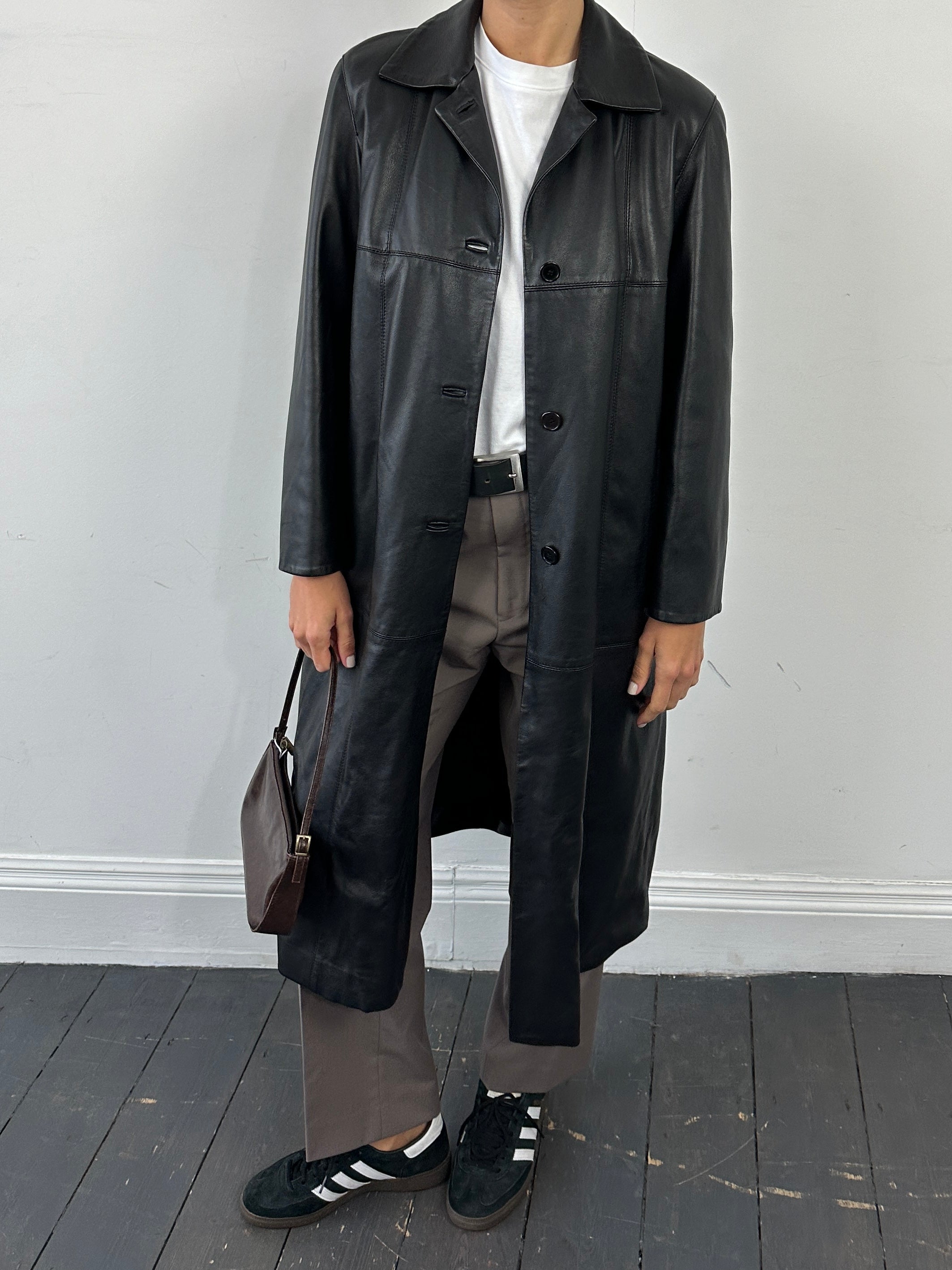 Conbipel smooth leather trench coat for women, size large, featuring classic design and sleek texture.