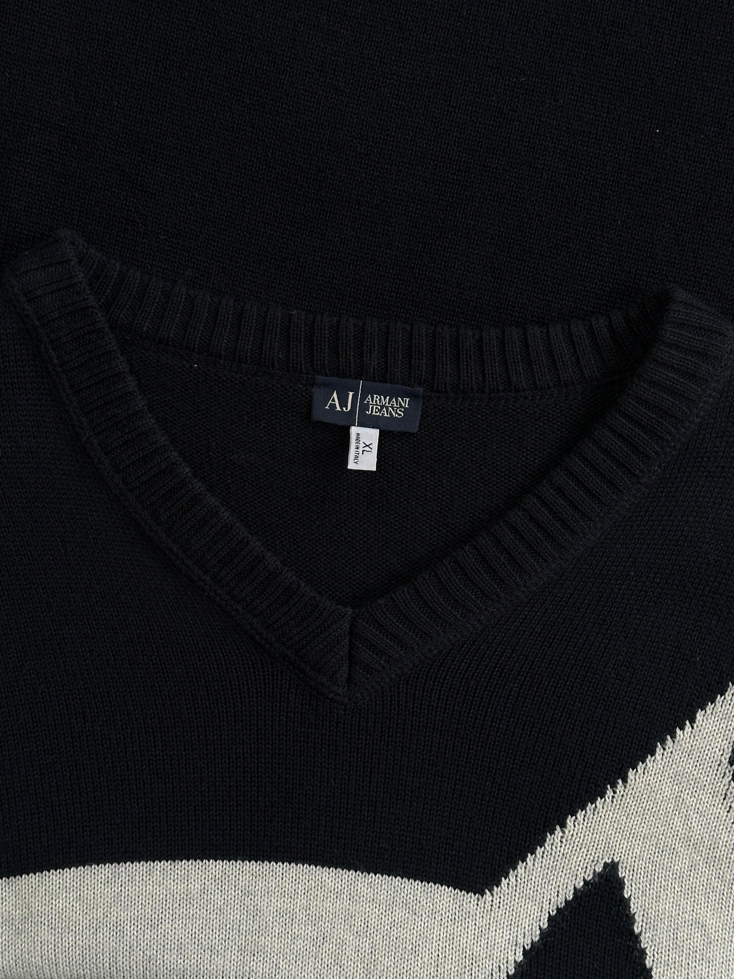 Armani Jeans virgin wool knitted jumper with logo, in black, featuring a crew neck and ribbed cuffs, size M/L.
