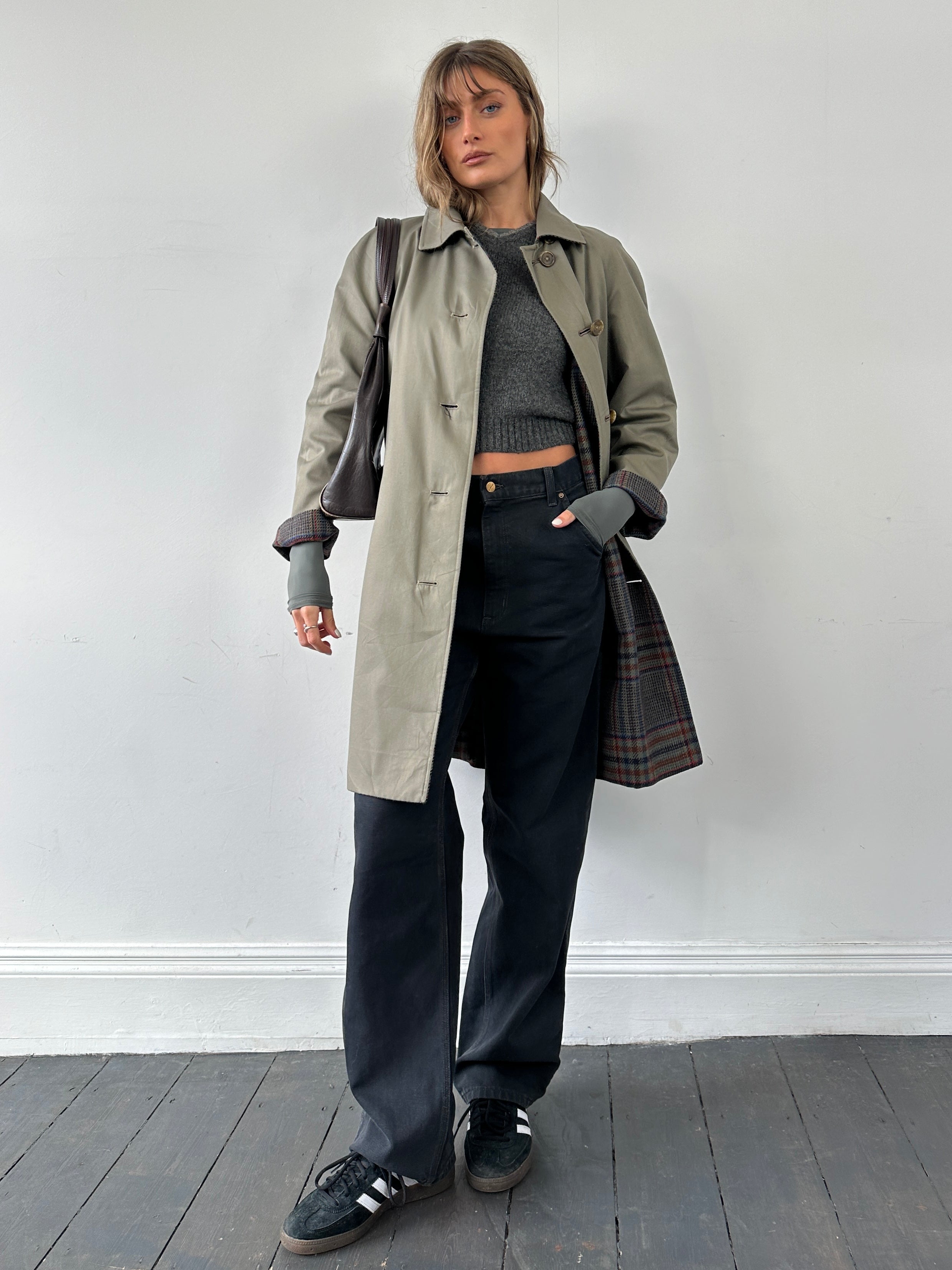 Vintage British vintage reversible wool trench coat in size small, showcasing classic design and double-sided fabric.