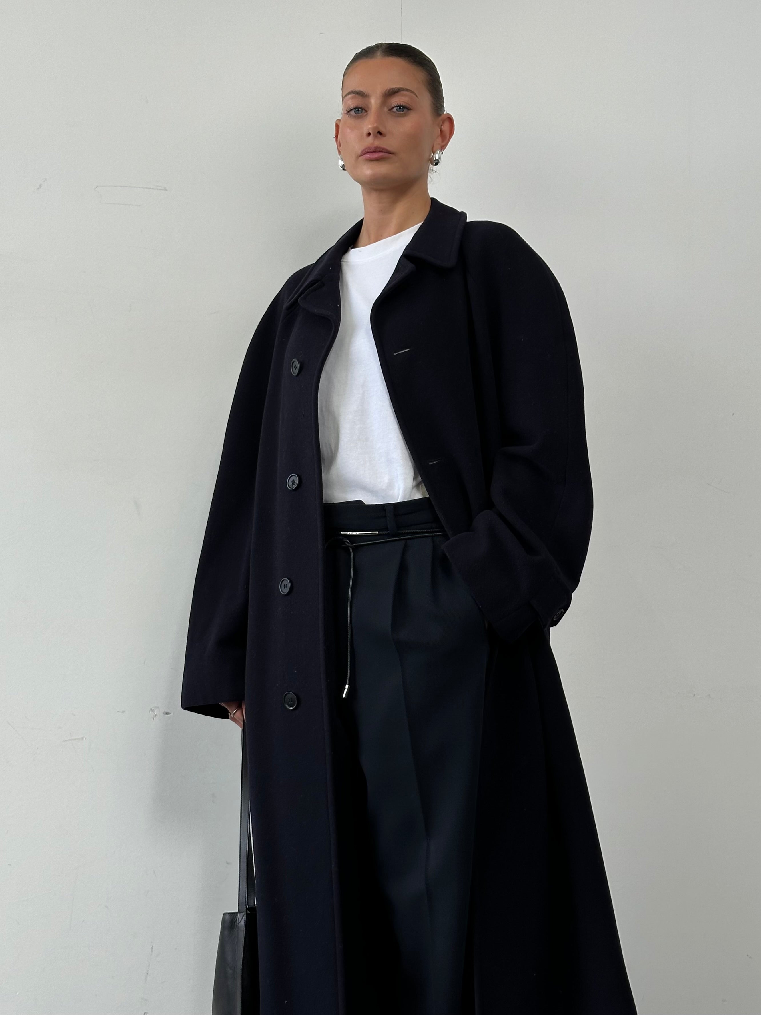 Yves Saint Laurent Pour Homme wool cashmere single-breasted coat in XL, shown with classic lapels and tailored fit.