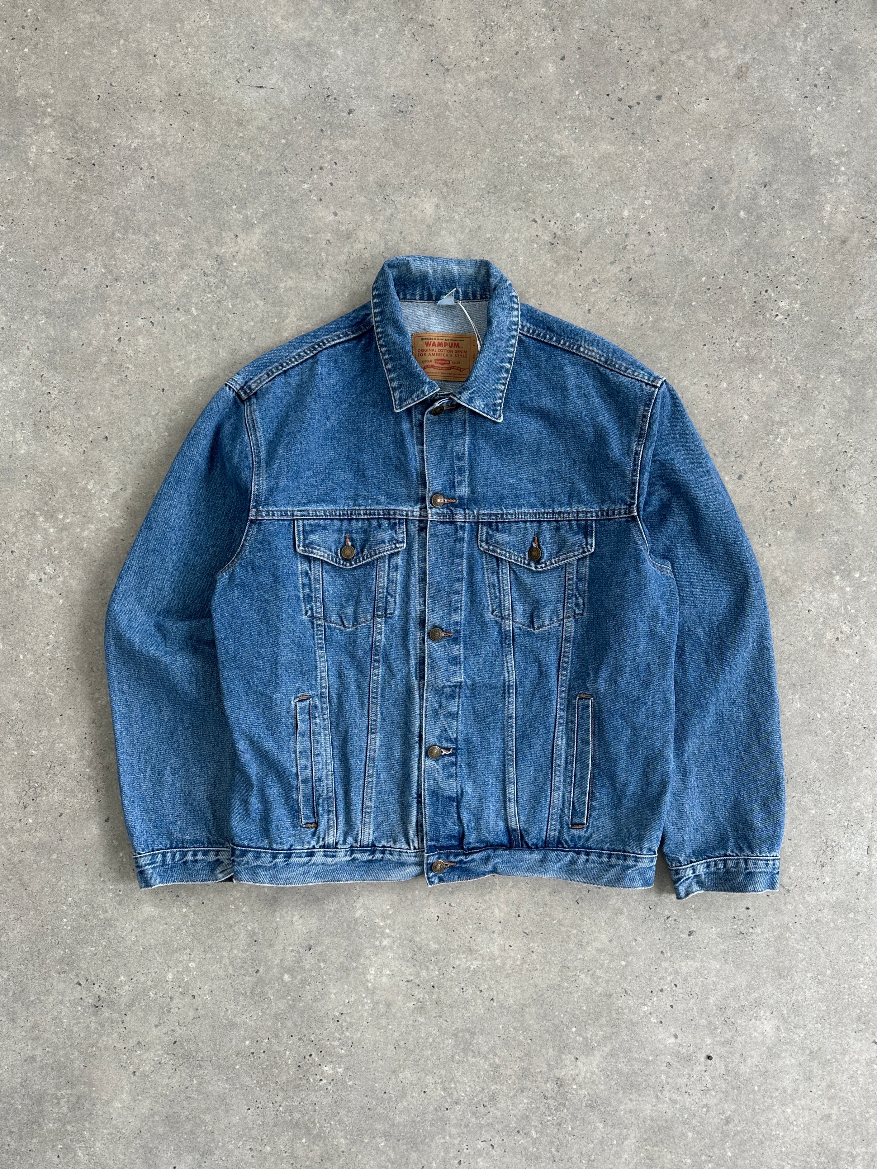 Vintage oversized pure cotton denim jacket in XL, featuring classic blue denim with a relaxed fit and vintage style.