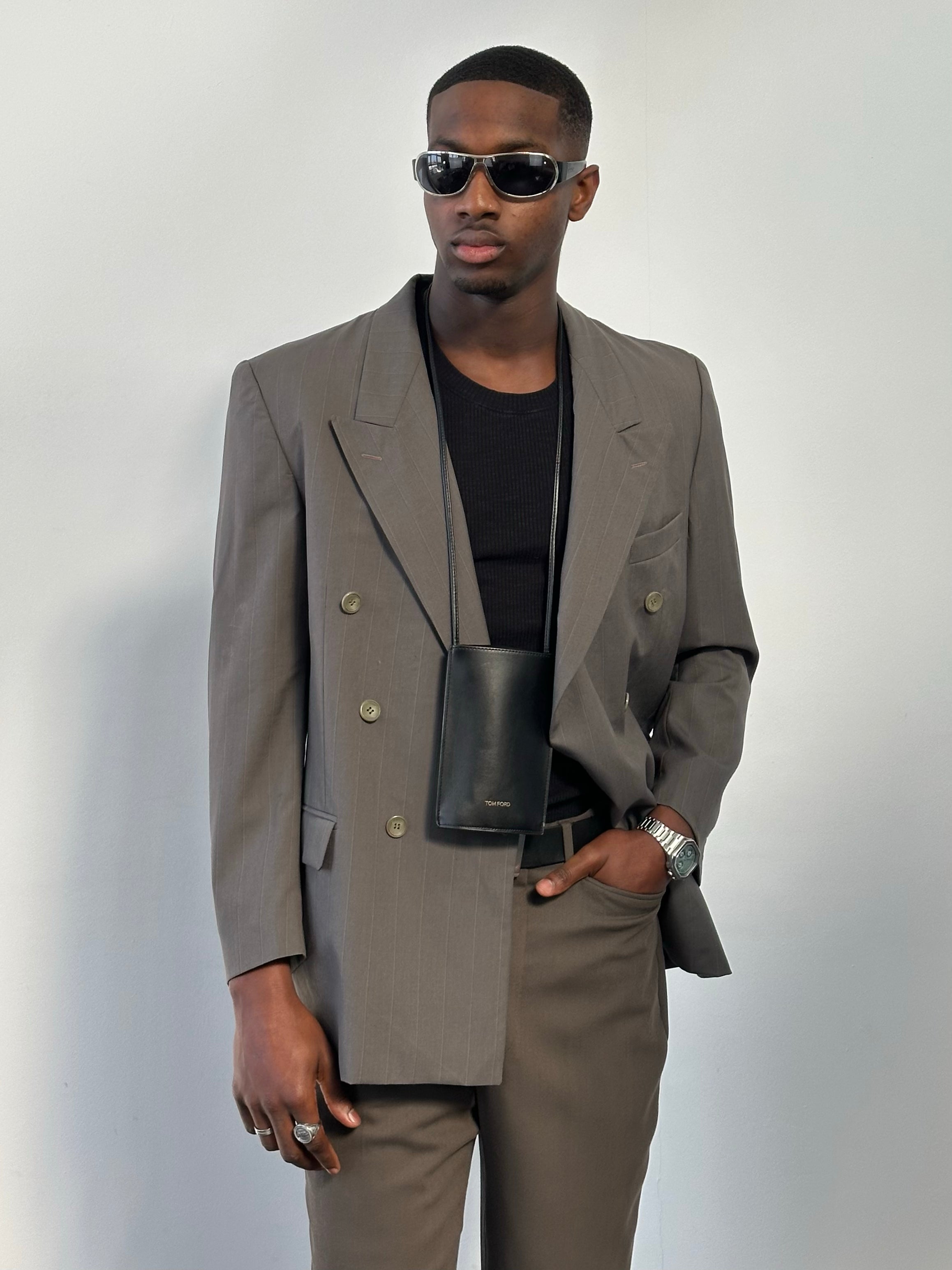 Yves Saint Laurent 1990s pure wool double-breasted blazer in classic style, featuring structured fit and vintage tailoring.
