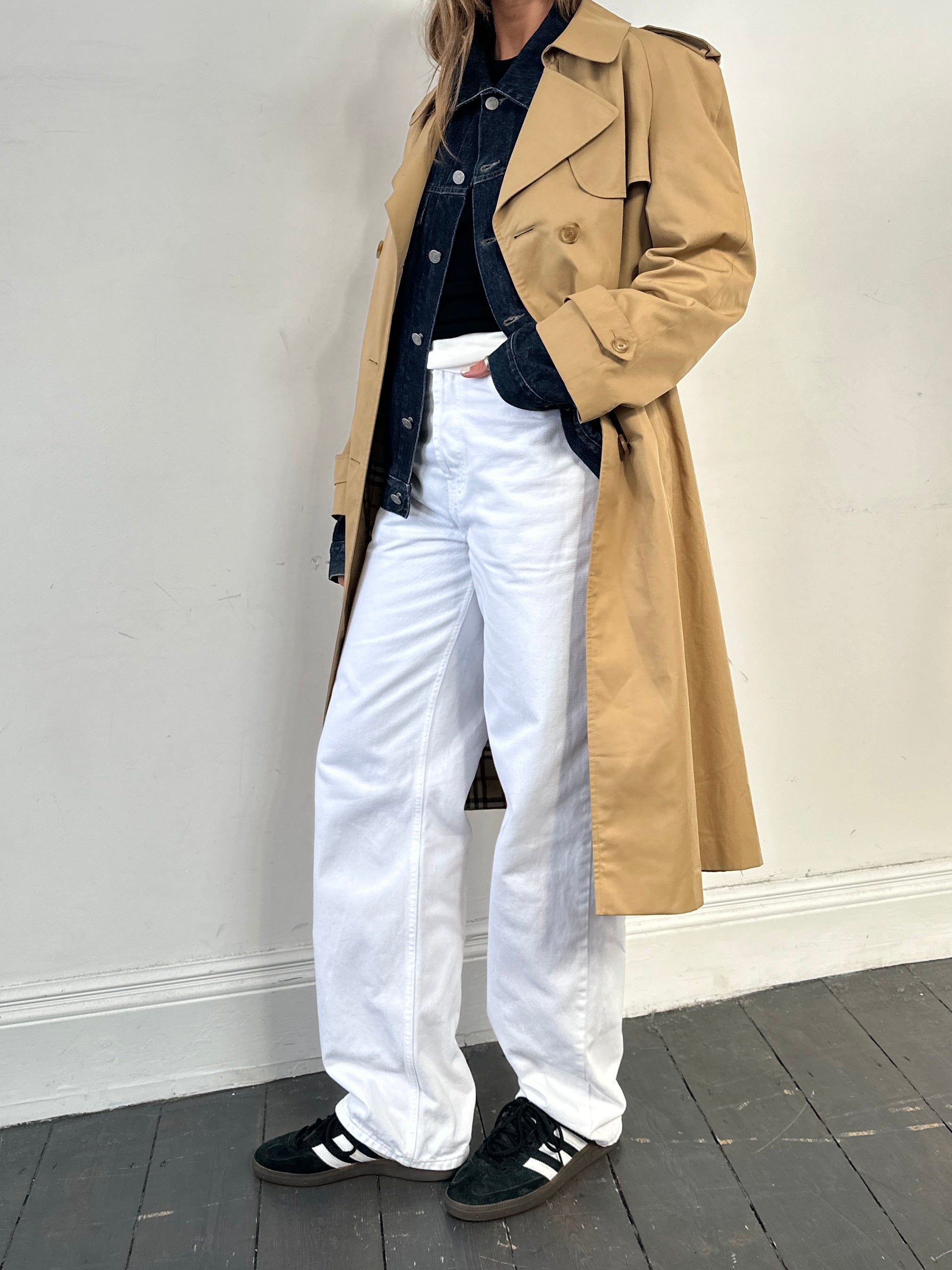 Vintage cotton double-breasted belted trench coat in size L, featuring classic design and timeless style.