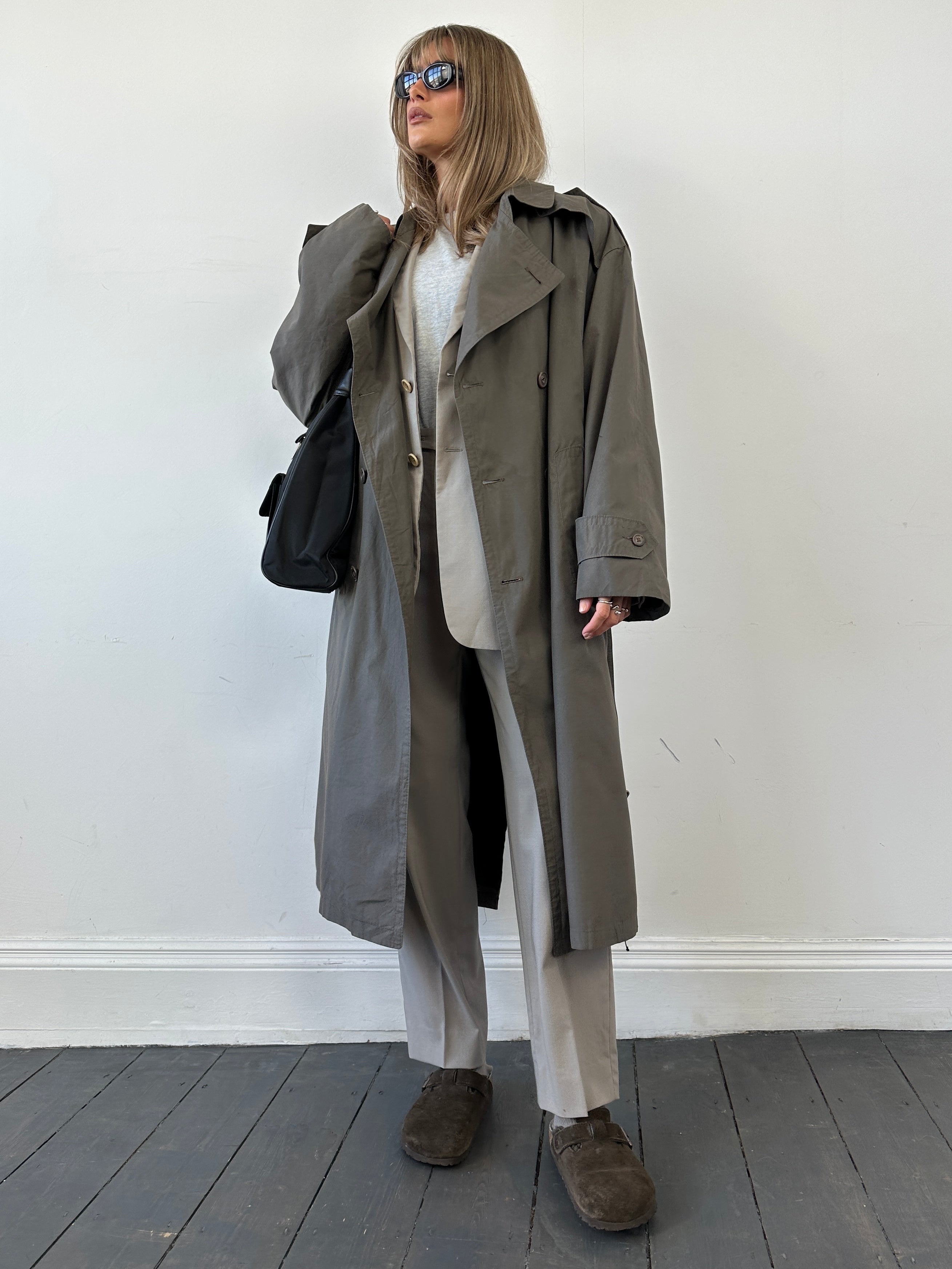 Christian Dior belted cotton wool trench coat in beige with a classic design, size 42R/XL, featuring a tailored fit and stylish collar.