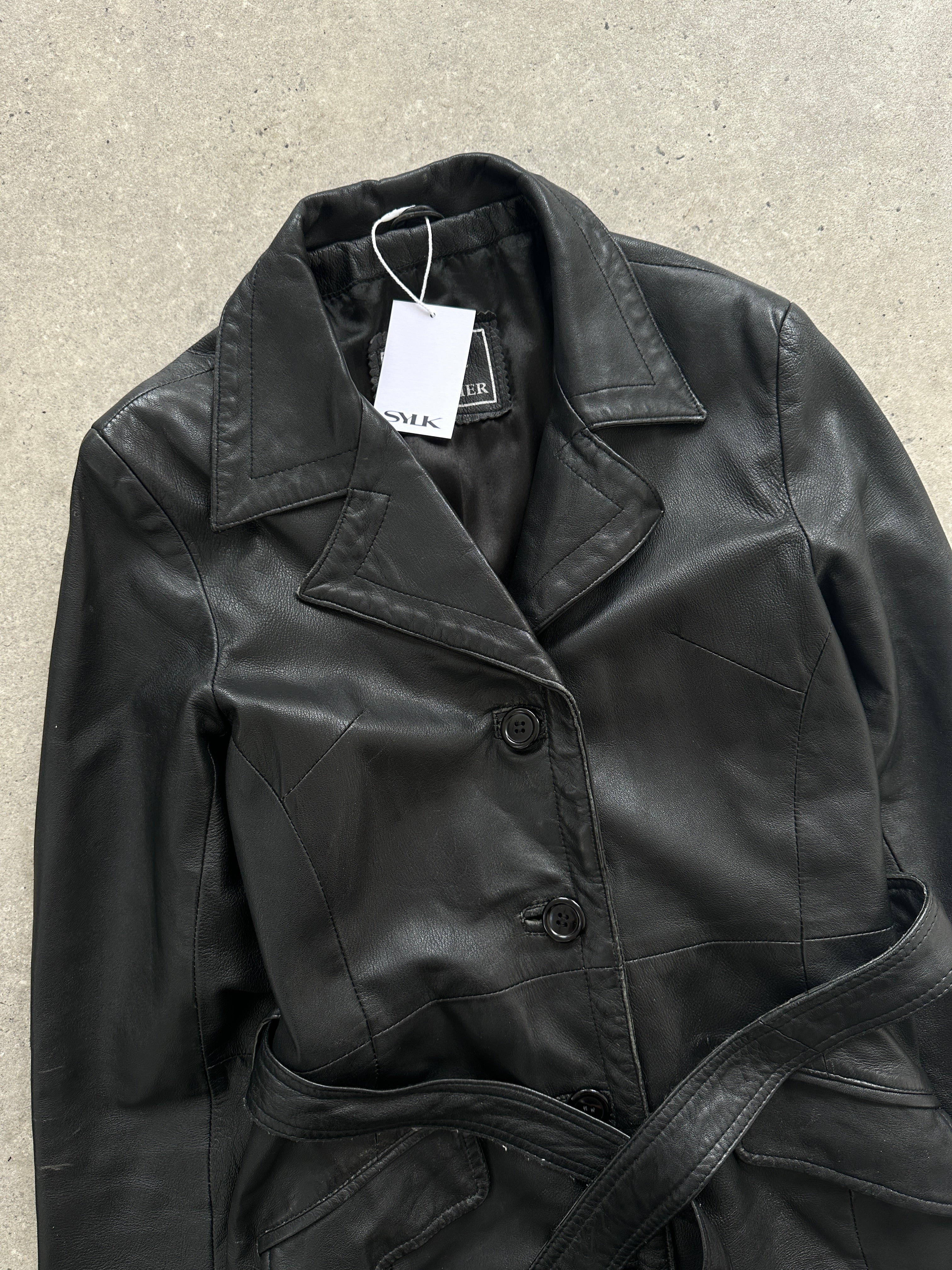 Vintage leather belted trench coat in size small, full-length jacket with classic design and stylish details.