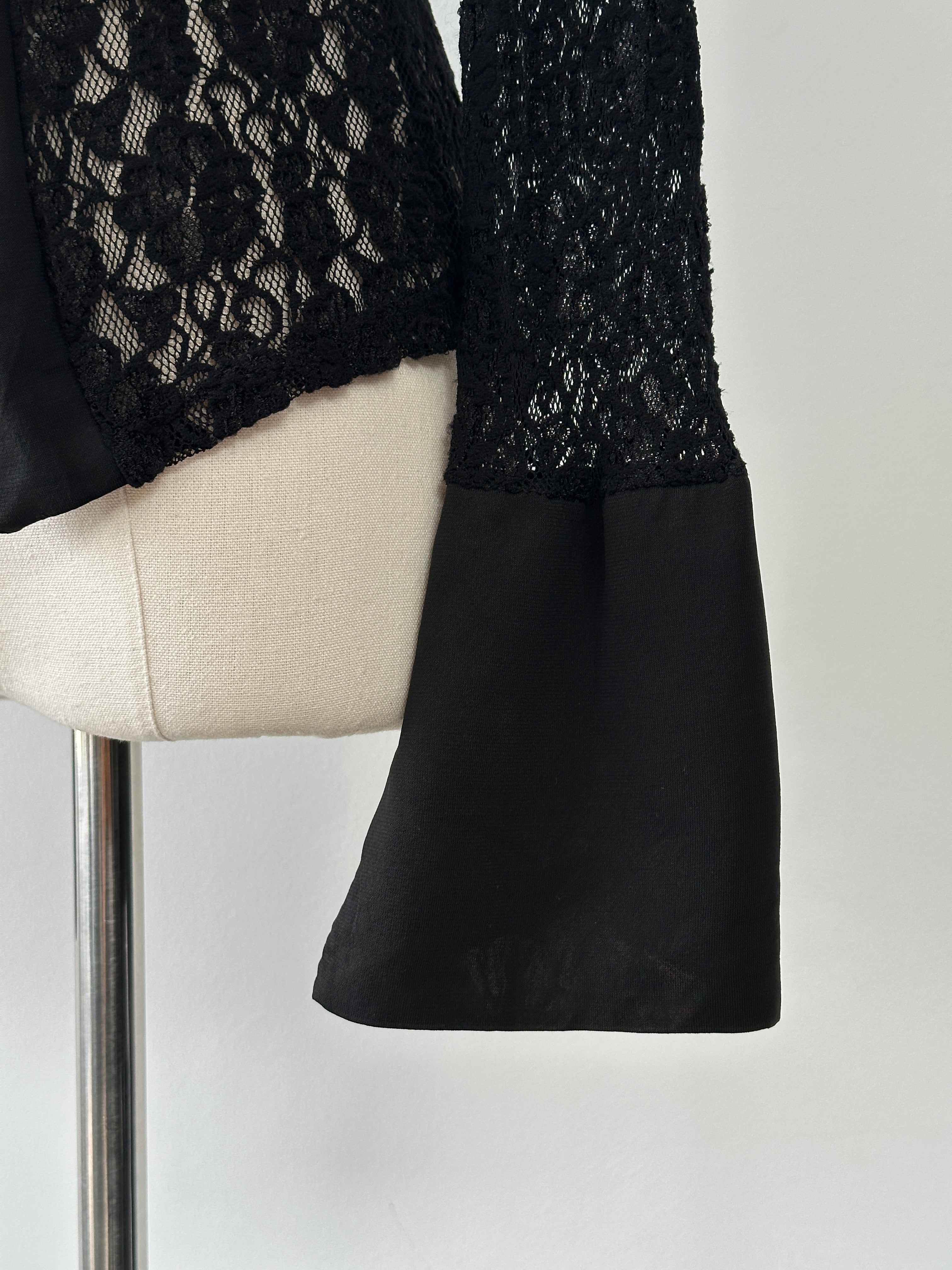 Vintage Italian 2000s lace shirt with open front, flute sleeves, and vintage styling, displayed on a plain background.