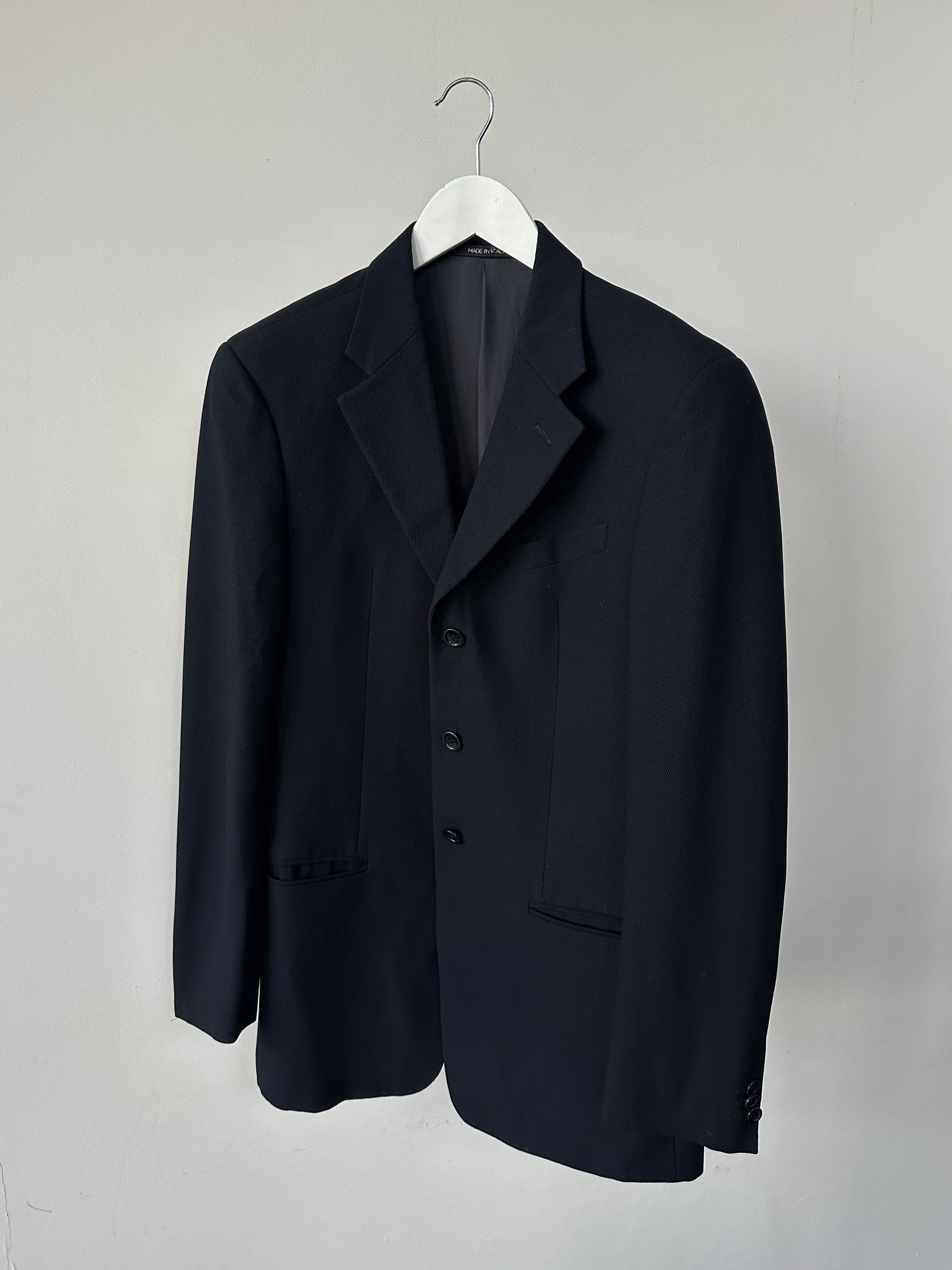 Armani Collezioni pure wool ribbed single-breasted blazer in size 38R/M, featuring a classic tailored fit and notch lapel.